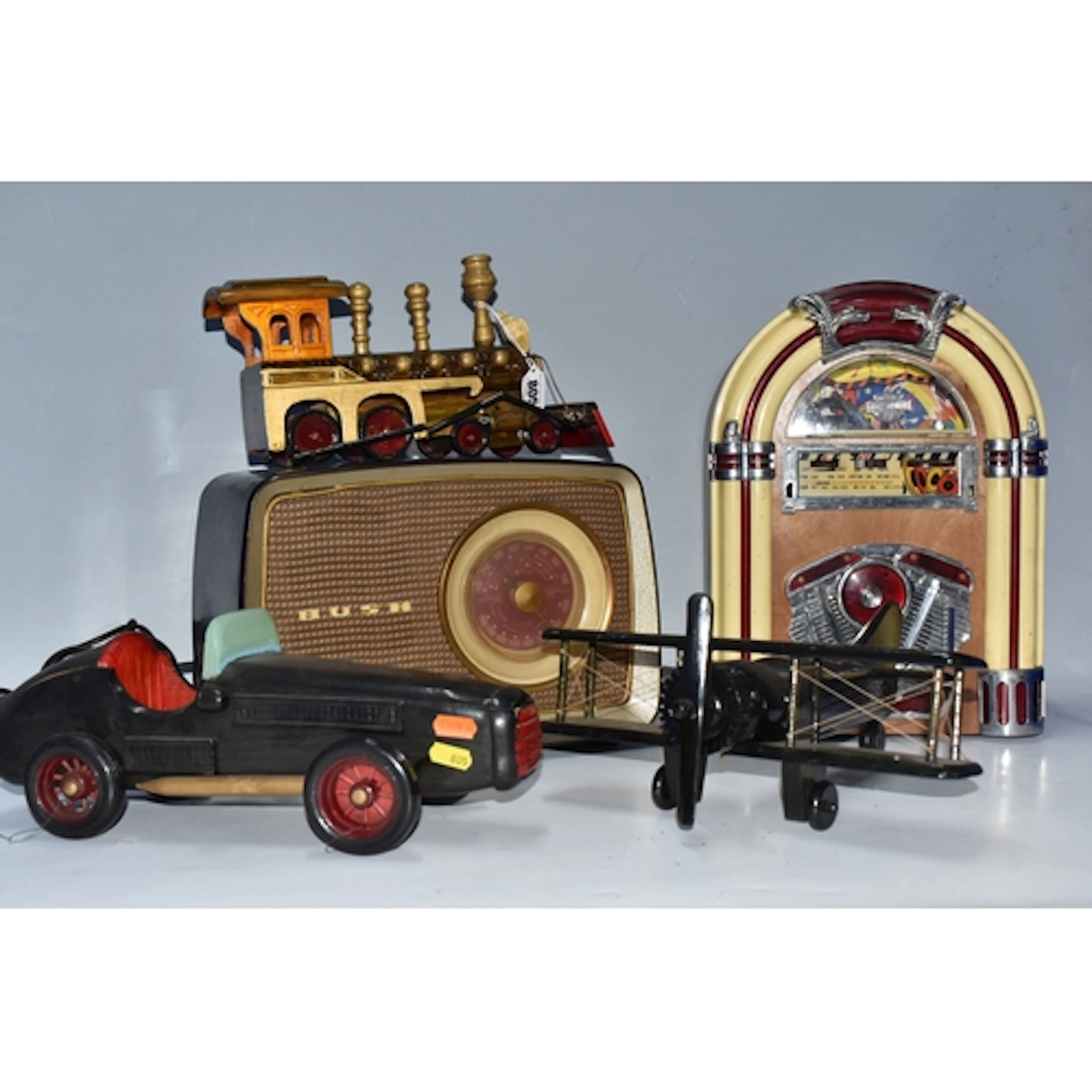 A GROUP OF RADIOS AND MODEL VEHICLES, comprising a vintage B...