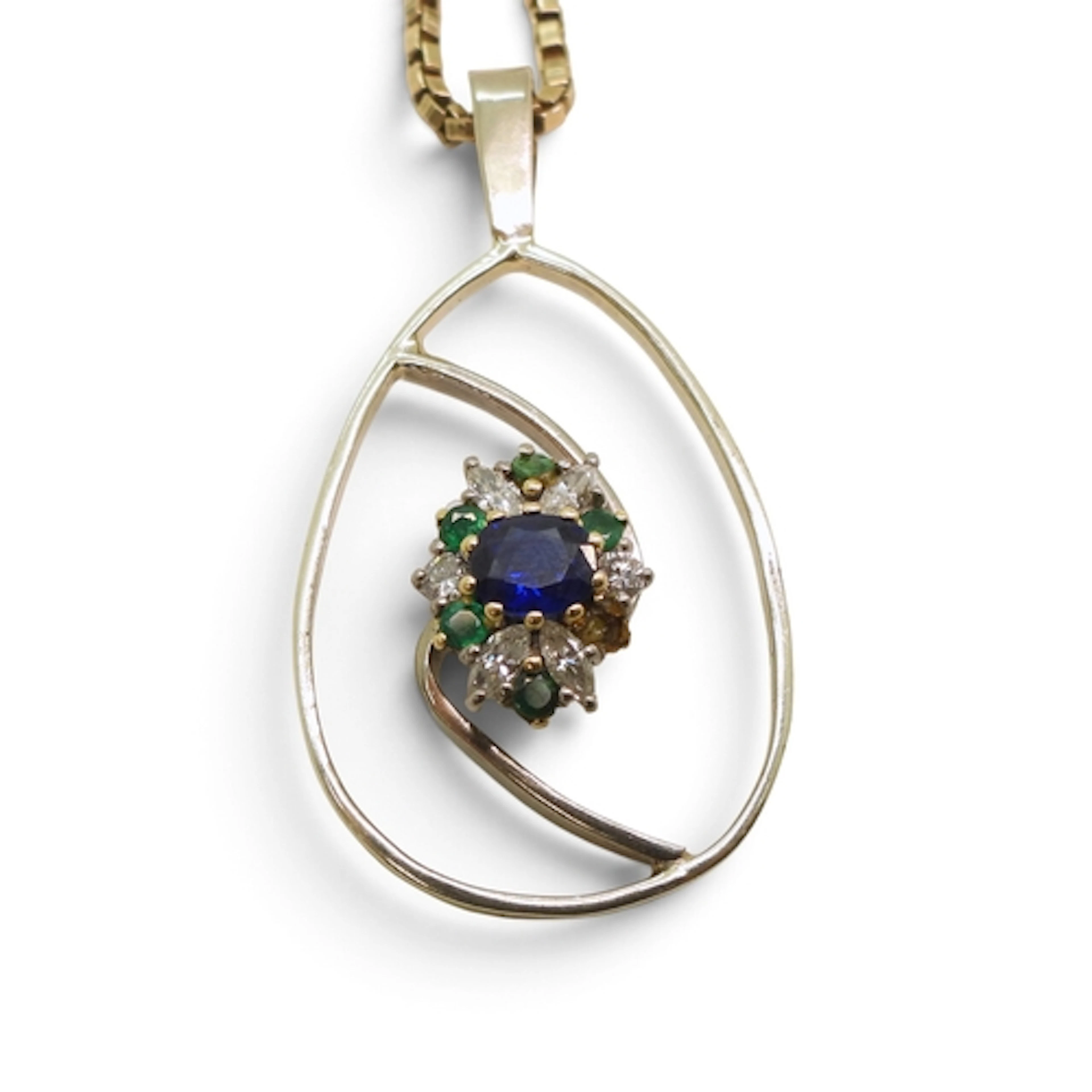 A yellow metal bespoke pendant set with a sapphire, diamond ...
