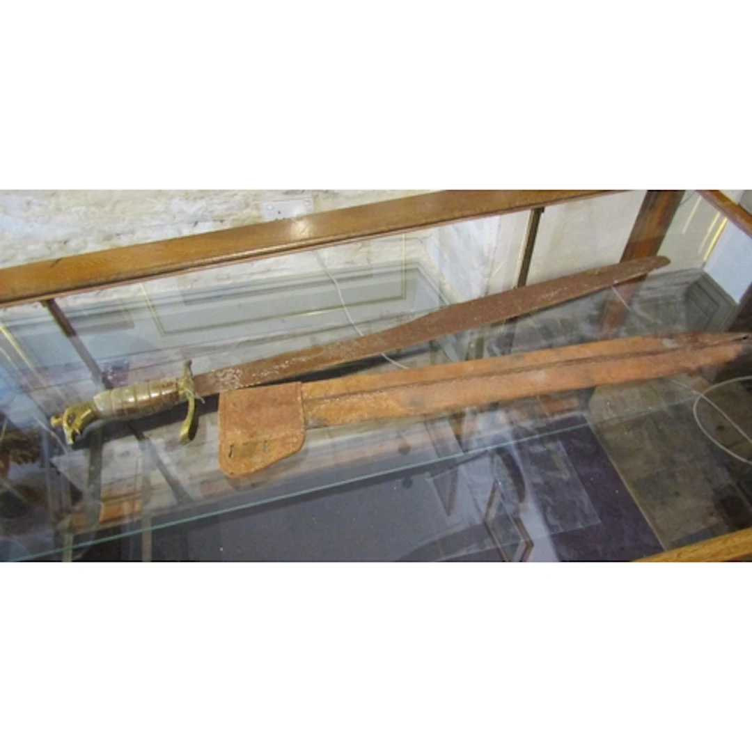 Officer's Sword with Leather Scabbard with Eagle Motif Decor...