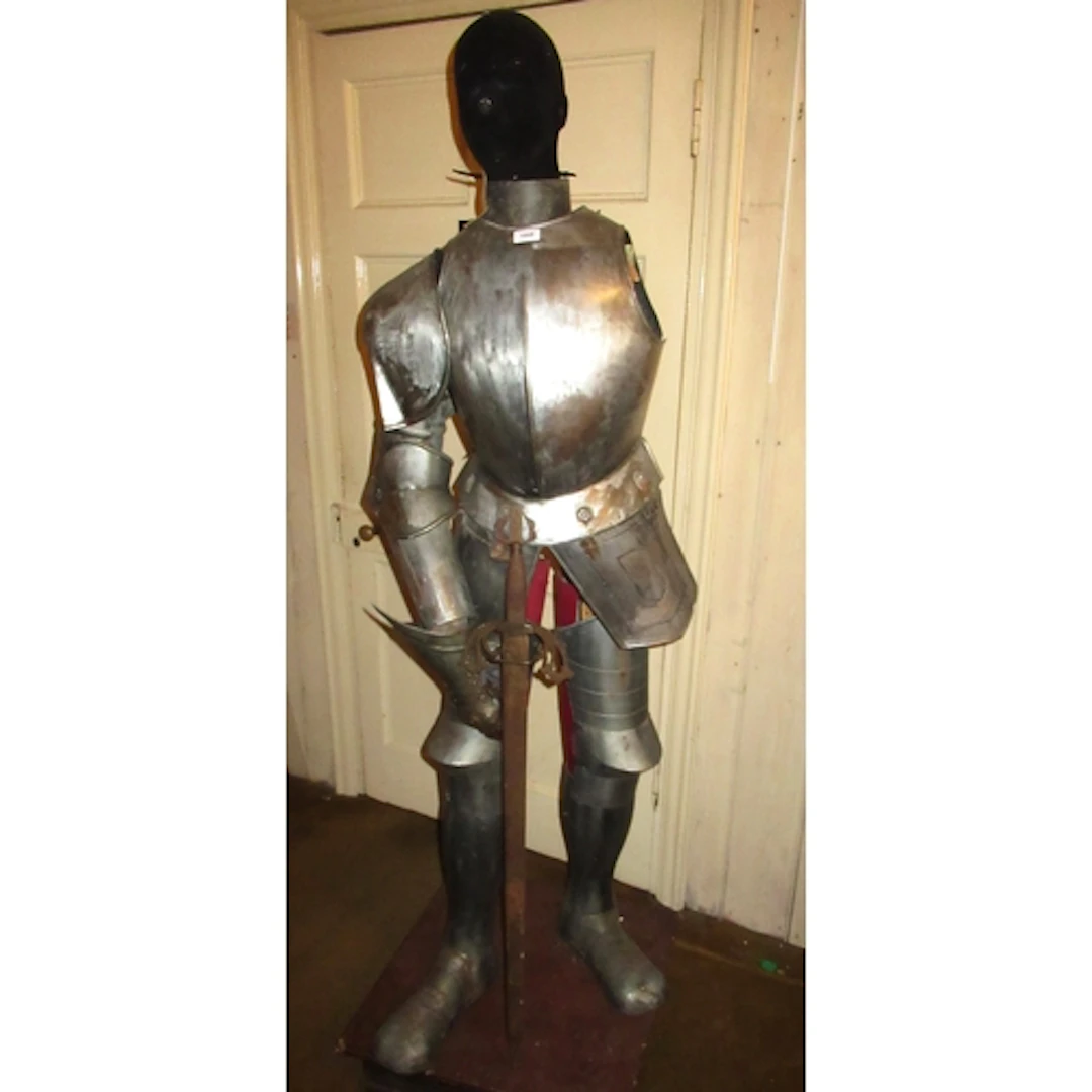 Part suit of armour with sword