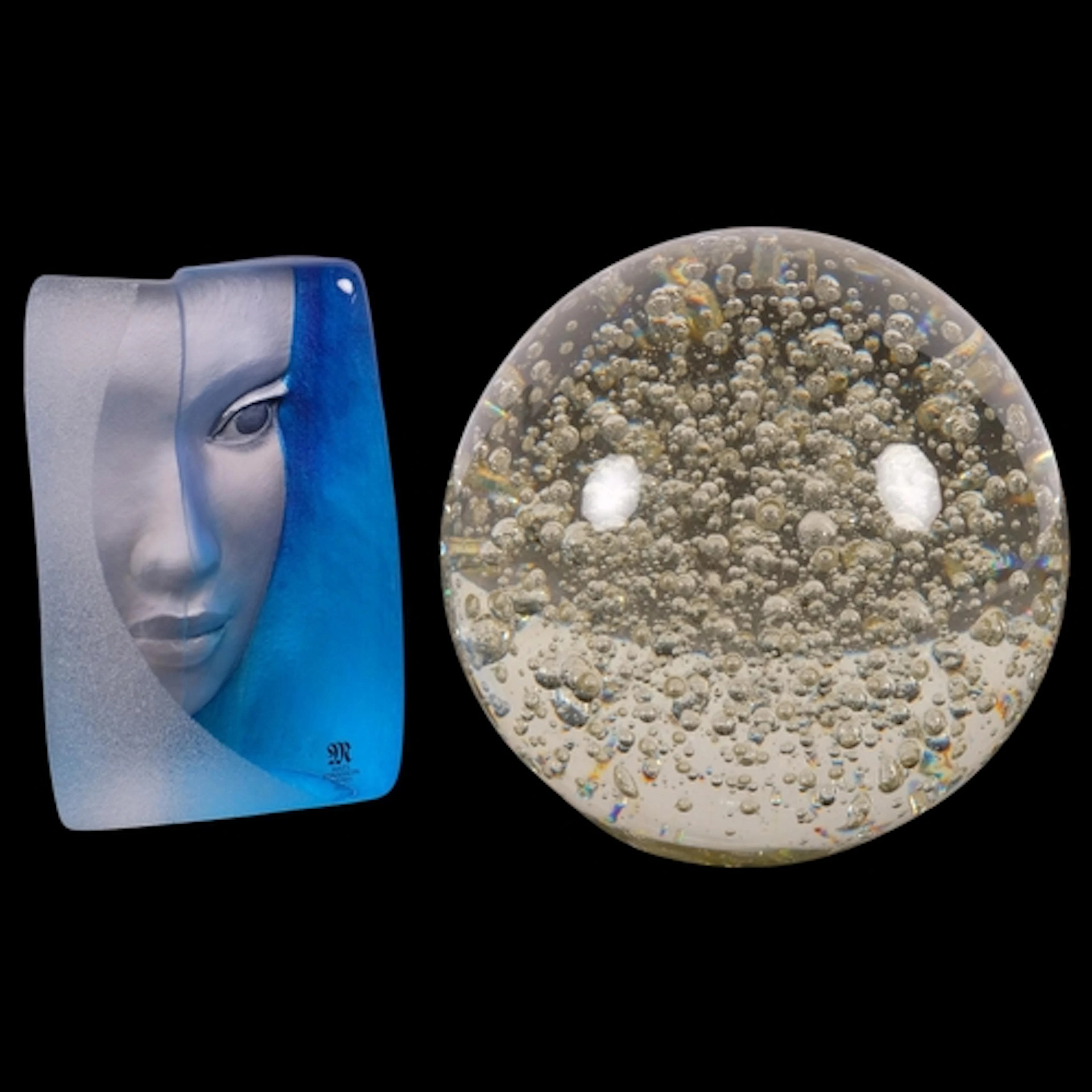 A large Antique globular bubble paperweight, and a Mats Jona...