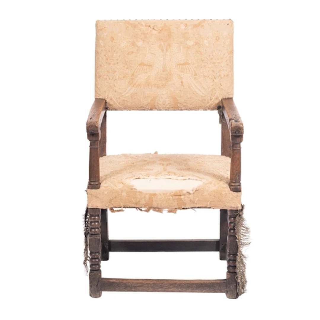 An oak and upholstered elbow chair in William & Mary style, ...