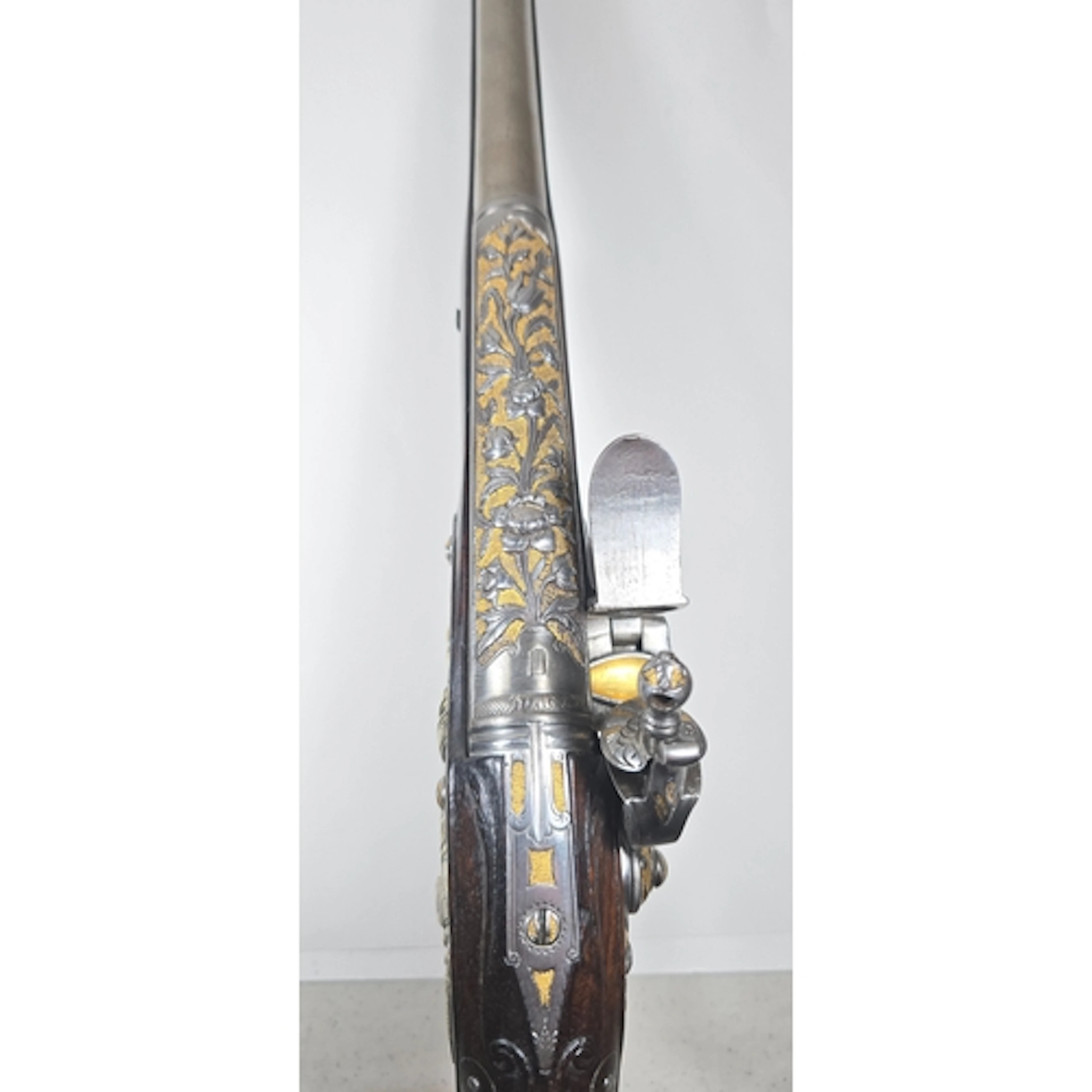 A fine French silver mounted holster pistol for the Oriental...
