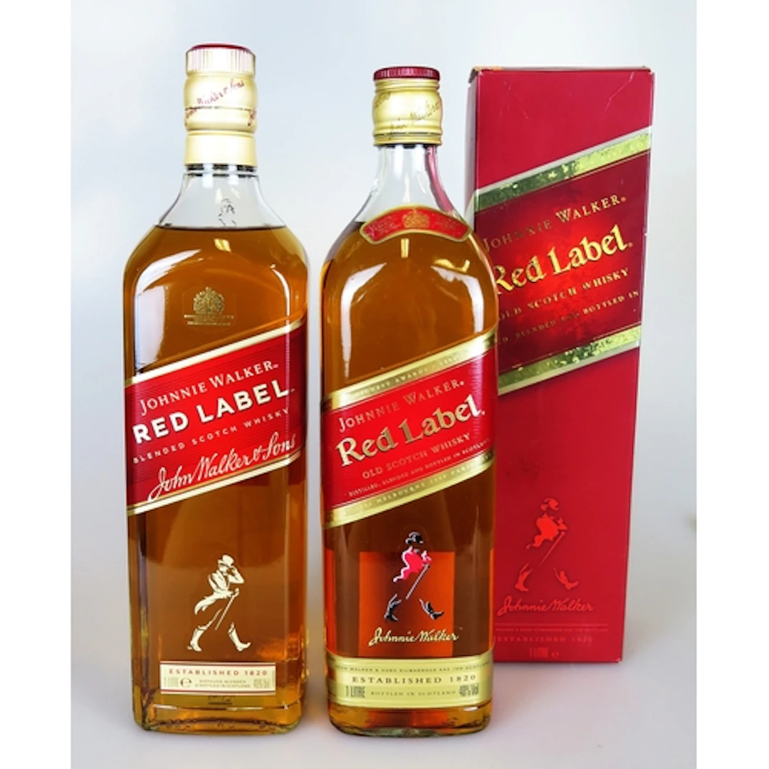 Two bottles of Johnnie Walker Red Label blended scotch whisk...