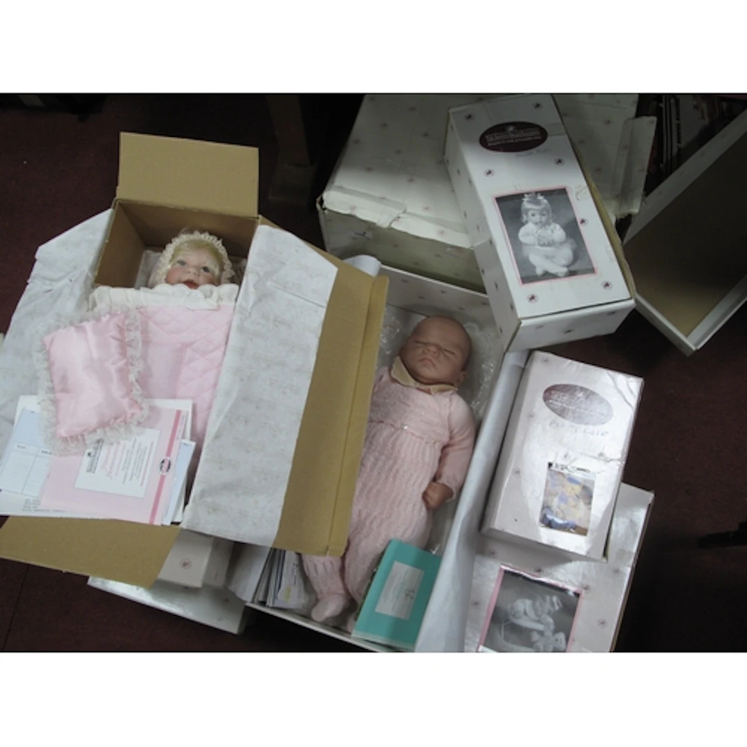 Thirteen boxed Ashton-Drake Galleries collectible dolls, inc...