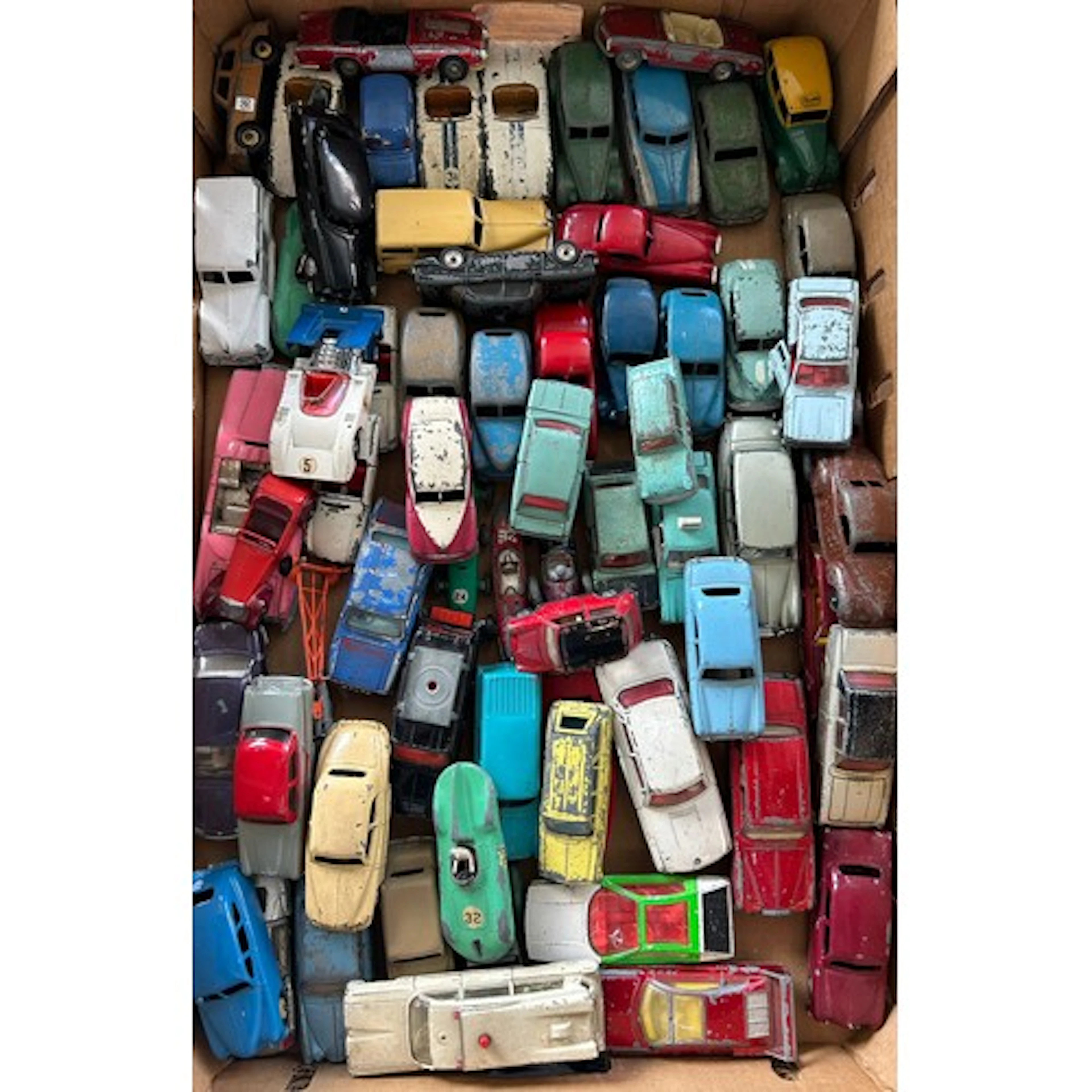 A quantity of Dinky Vehicles for restoration. Over 60 exampl...