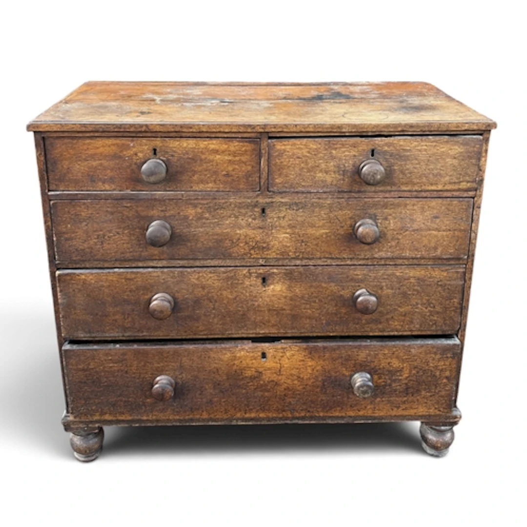 AN EARLY 19TH CENTURY OAK CHEST OF TWO SHORT AND THREE LONG ...