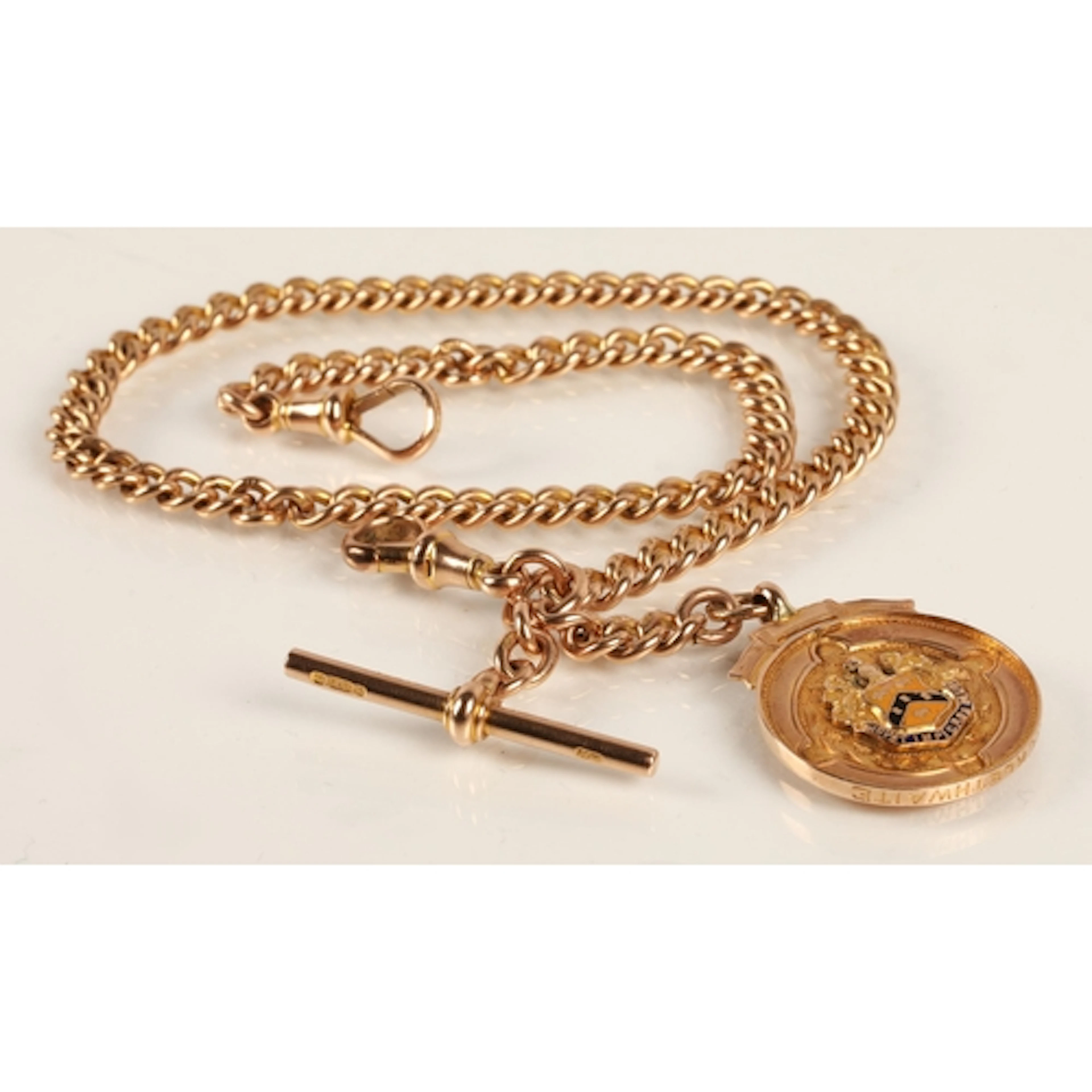9ct gold watch chain with 9ct gold fob medallion inscribed '...