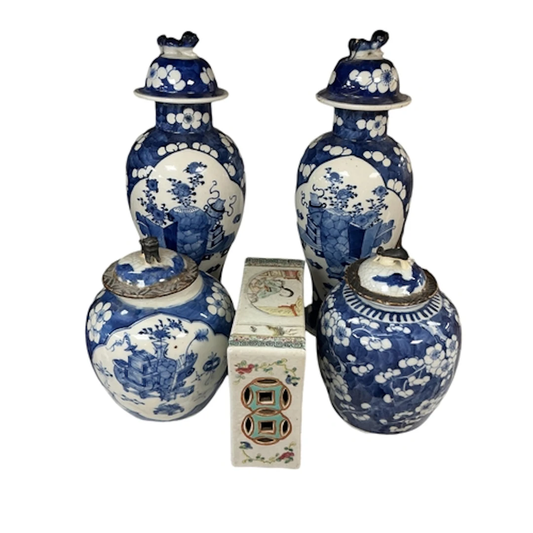 A pair of 19th century Chinese blue and white baluster prunu...