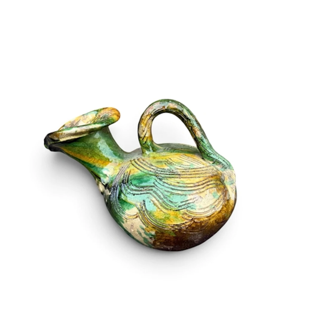 A SPANISH GREEN AND YELLOW GLAZE POTTERY VESSEL Engraved wit...