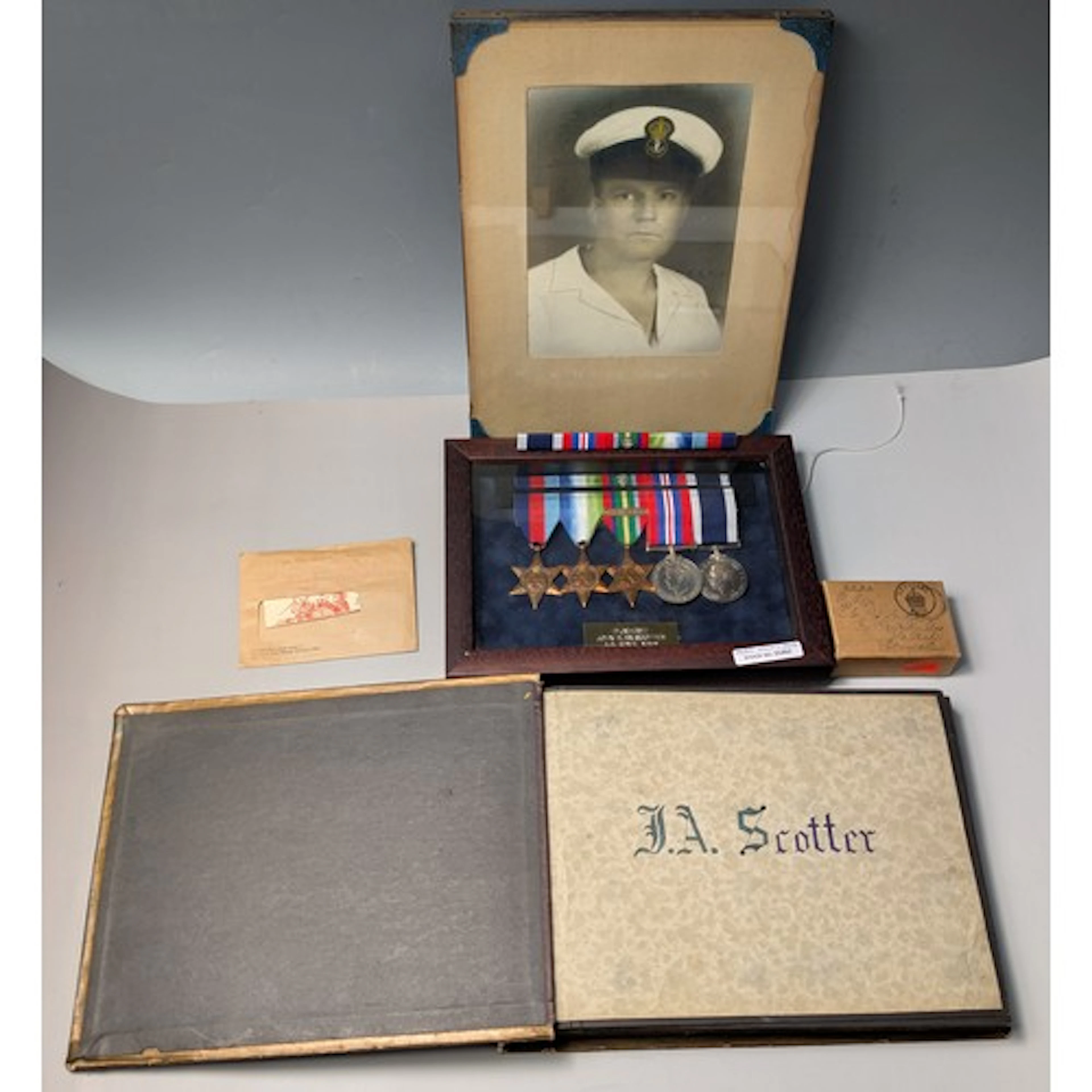Cased group of WWII medals with plaque for DAJX142977 JOHN A...