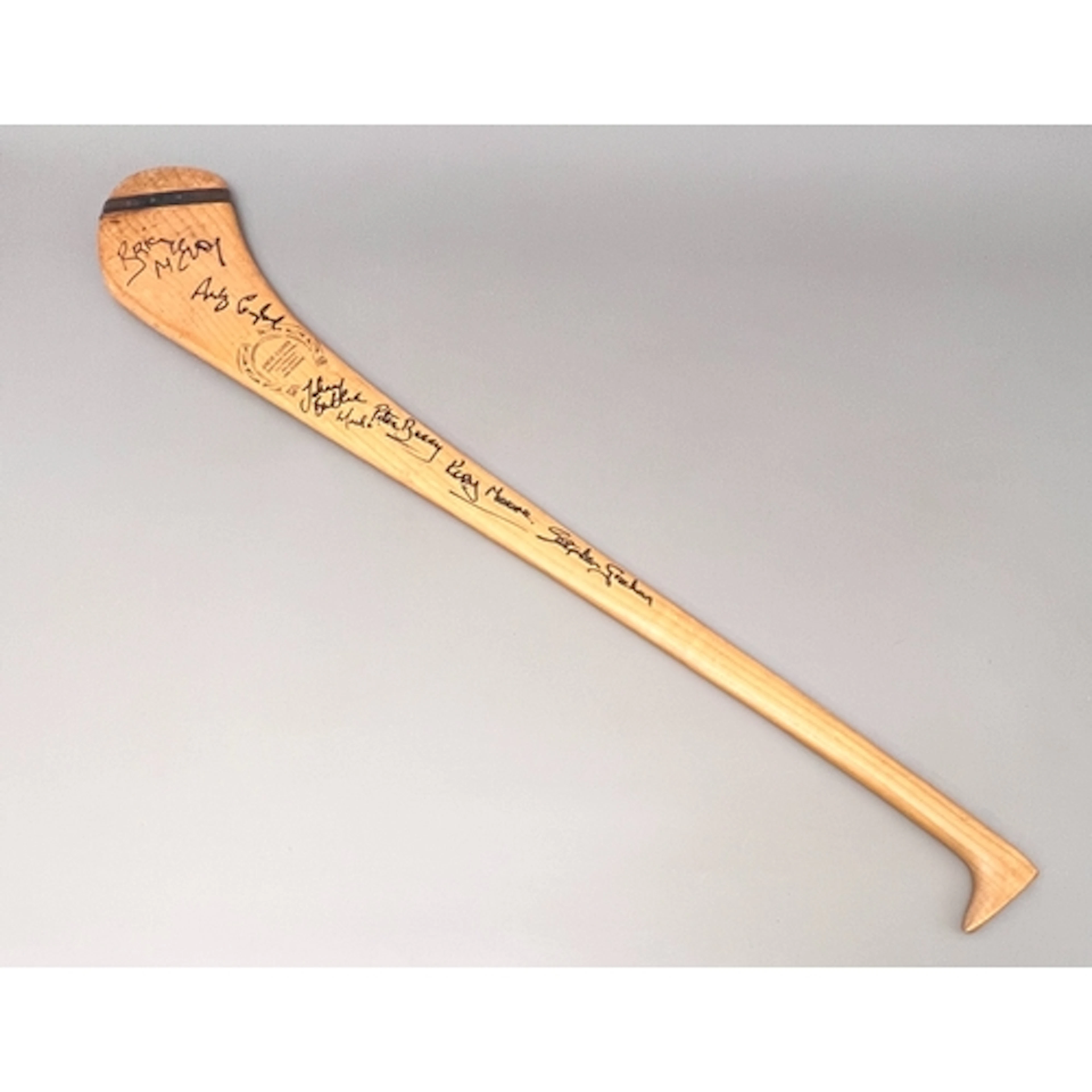 An early 2000s hurley stick signed by players from the Kilke...