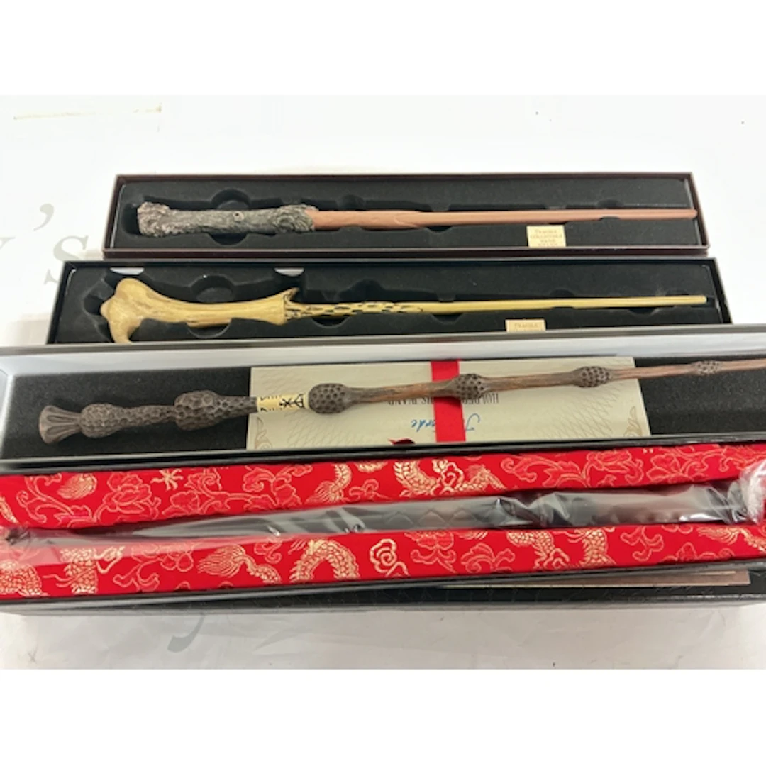 4 X Boxed Harry Potter Wands.