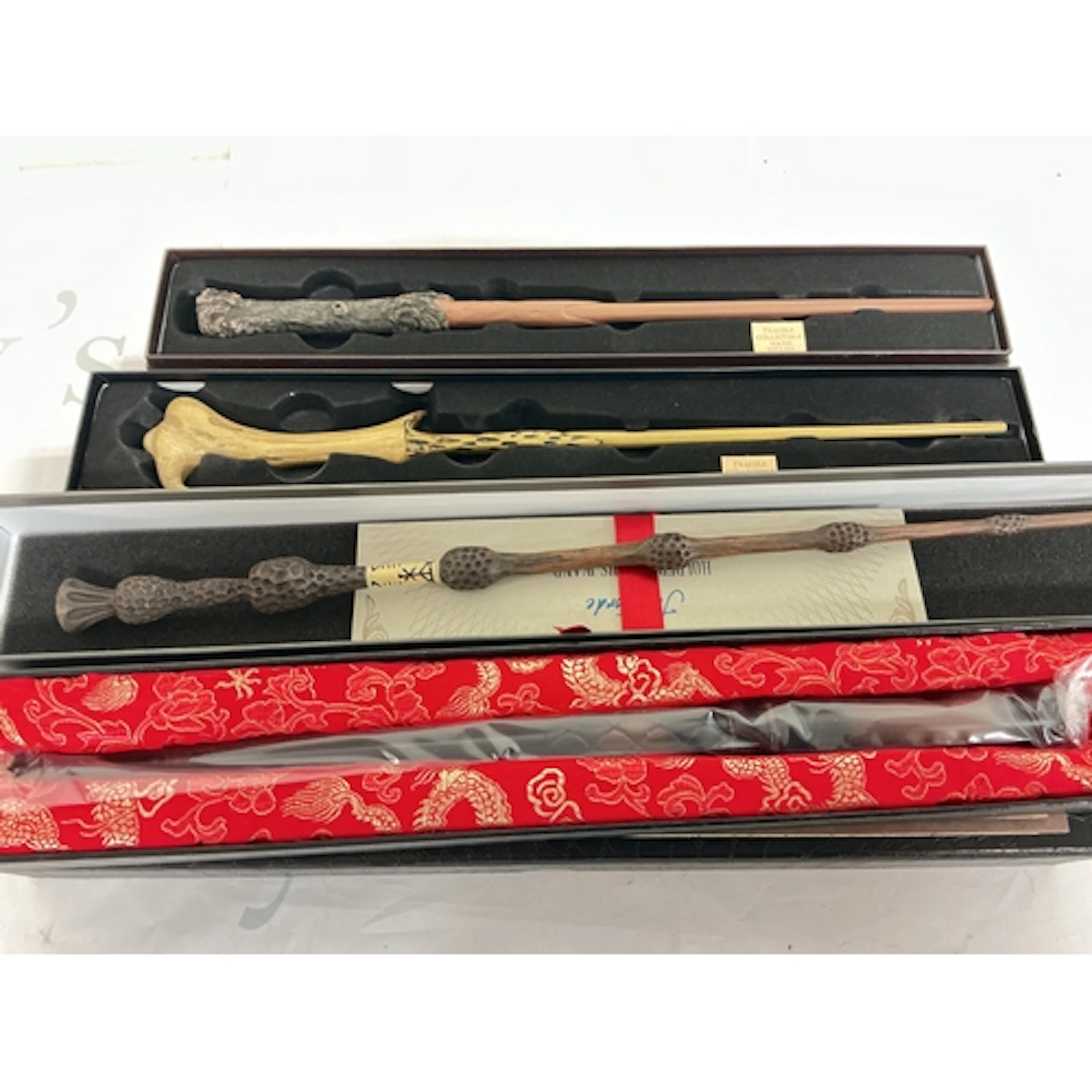 4 X Boxed Harry Potter Wands.