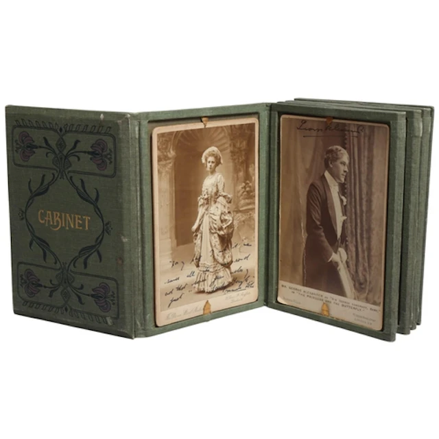 An attractive accordion-style book holding 8 cabinet cards o...