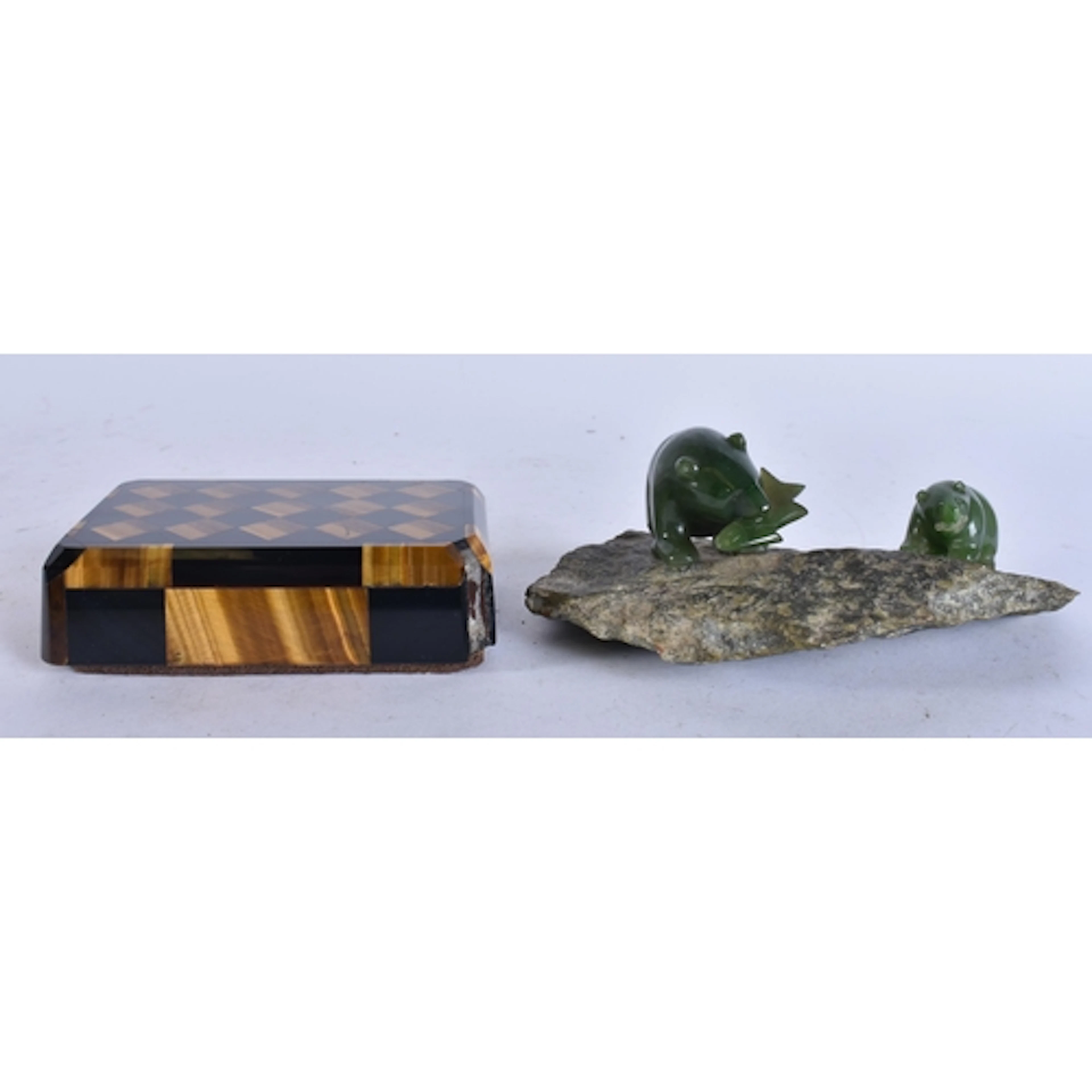 A STYLISH TIGERS EYE PAPERWEIGHT together with a jade sculpt...