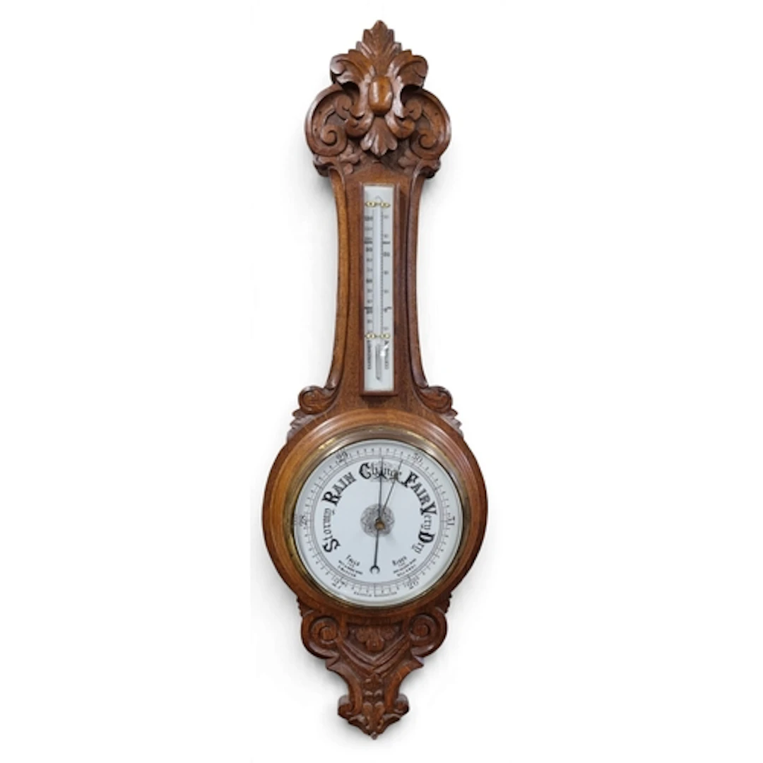 A 19th Century Oak Aneroid Barometer. W 30 x H 92 cm approx.