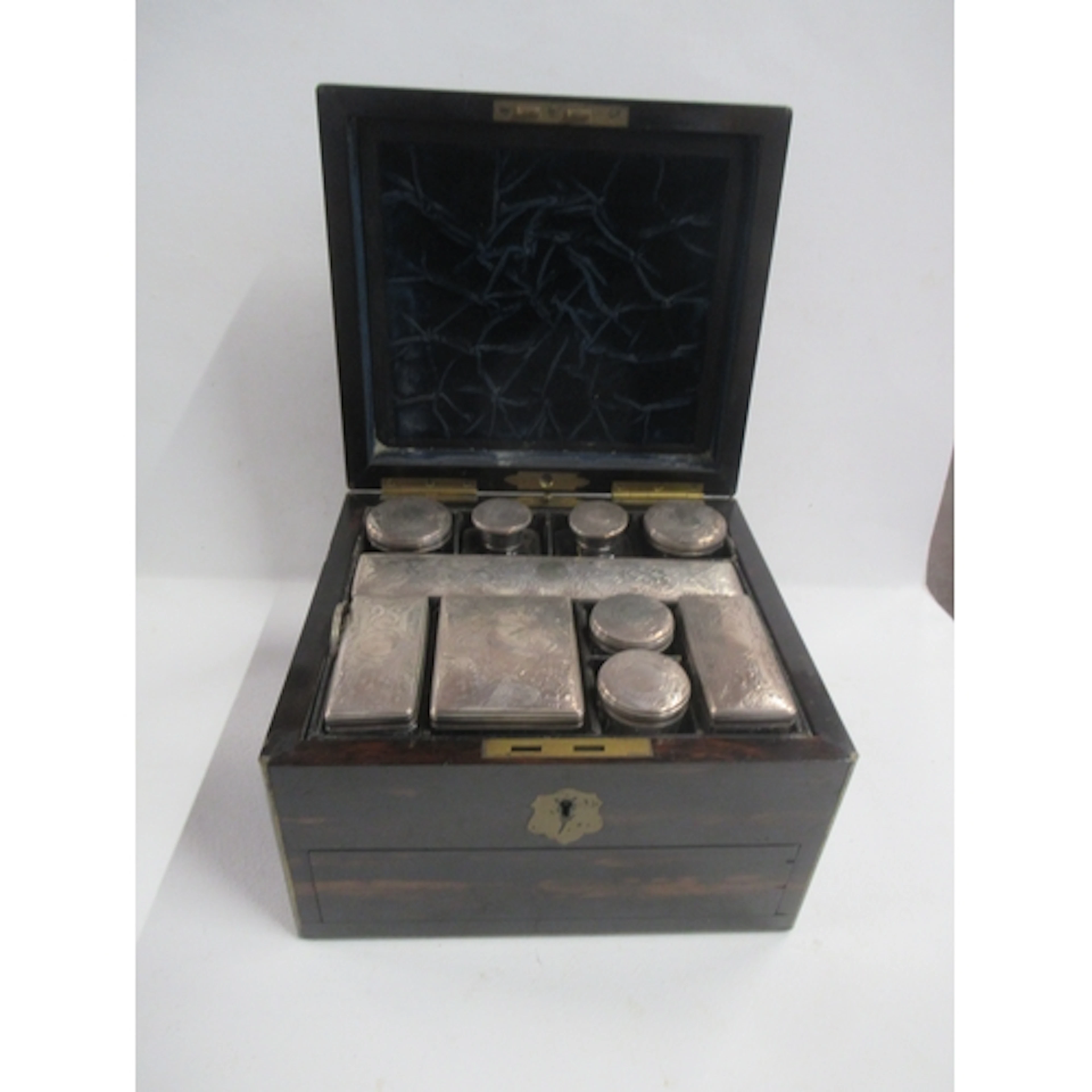 A Victorian coromandel wood vanity case, the interior fitted...
