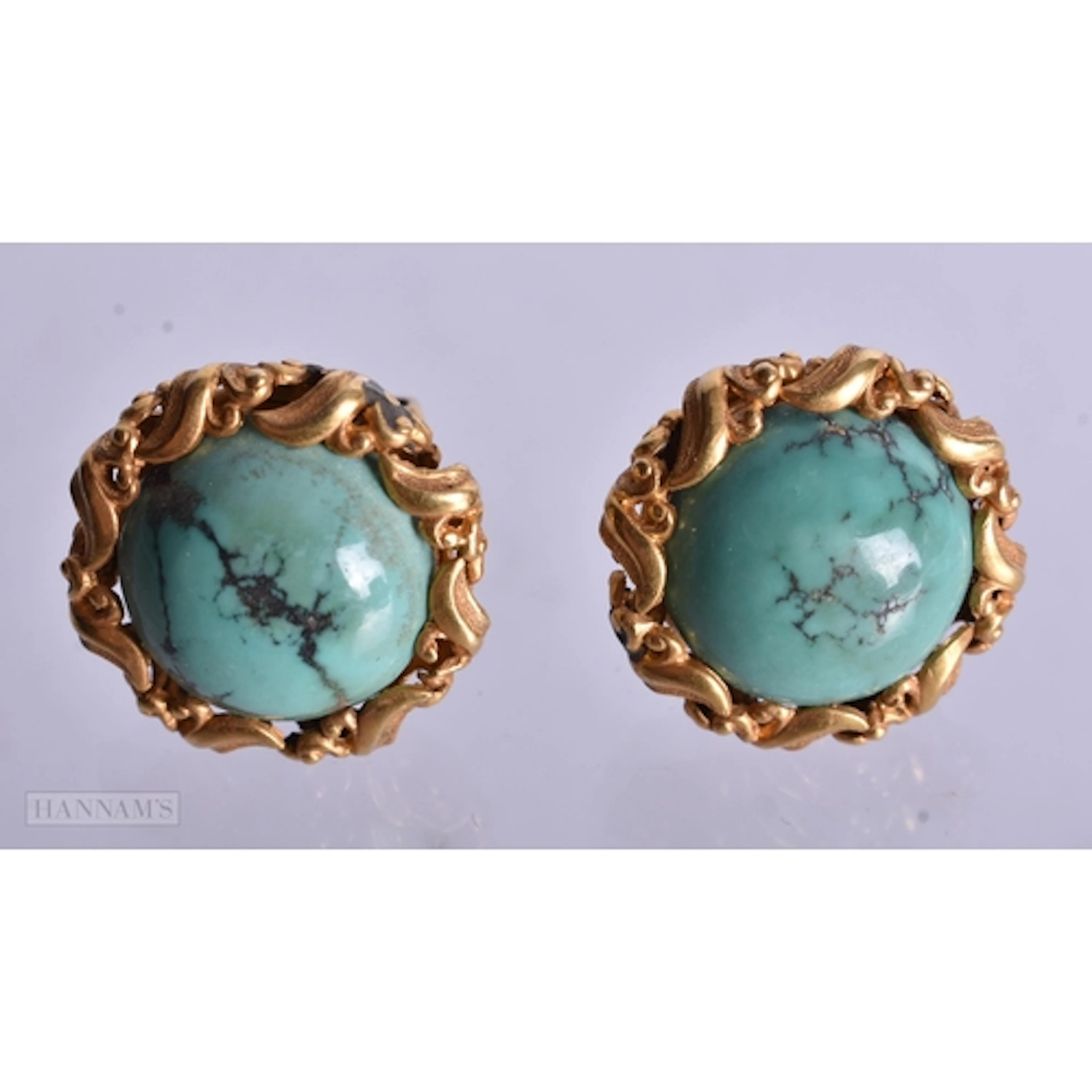 A PAIR OF 18CT GOLD MOUNTED TURQUOISE EARRINGS. 8.8 grams. 1...