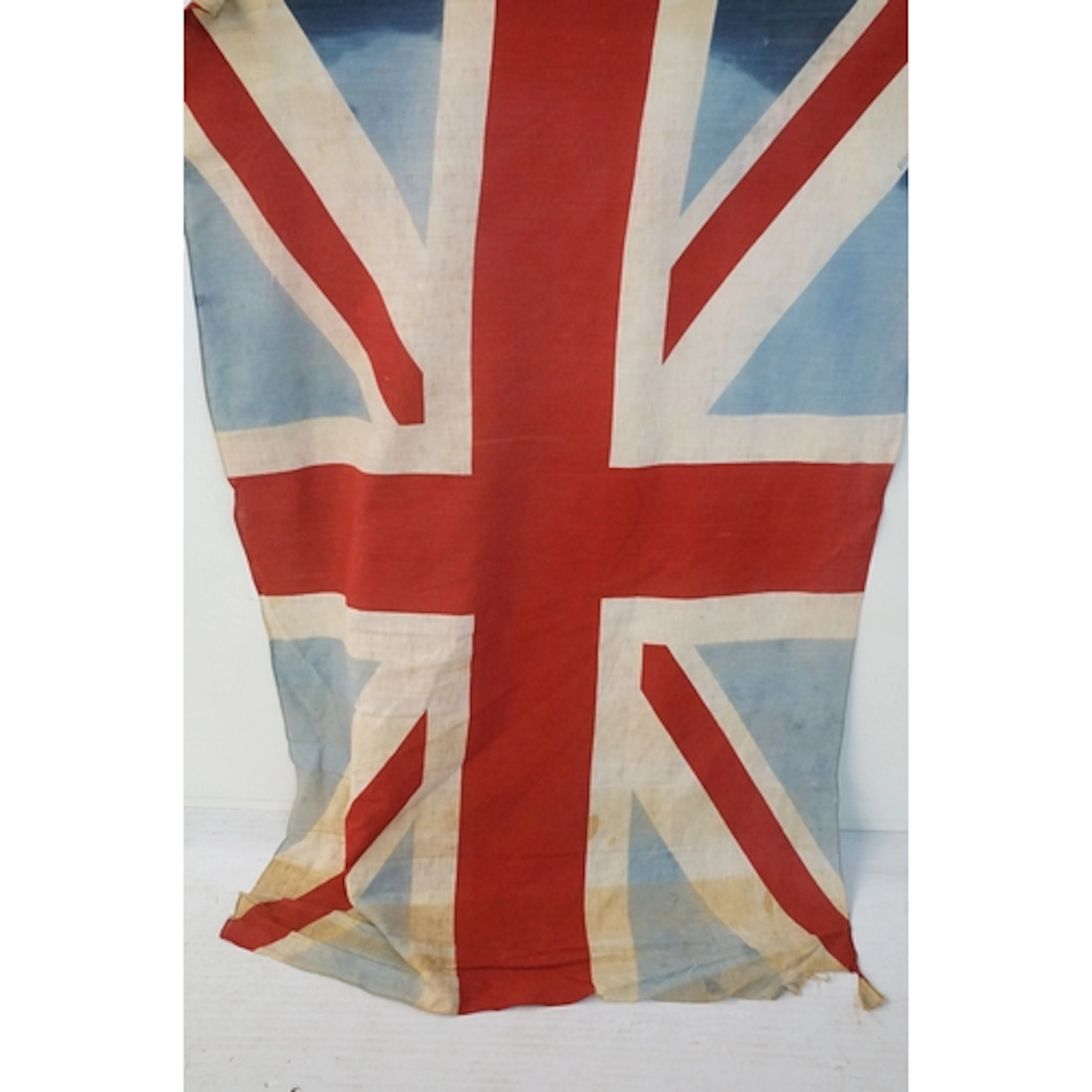 Vintage fabric Union Jack flag, 130cm x 84cm, on a painted w...