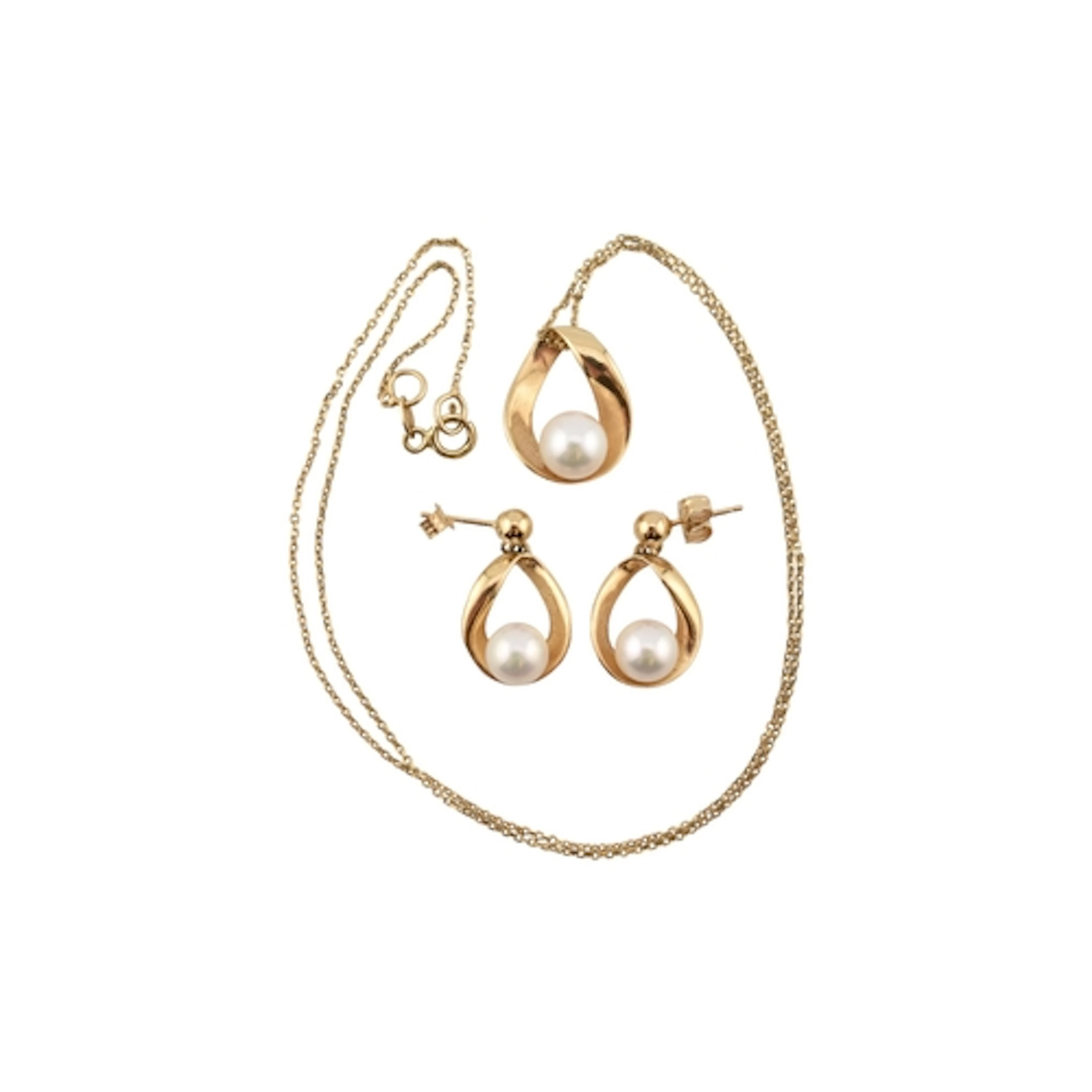 A 14ct gold and pearl pendant necklace and earring suite. Th...