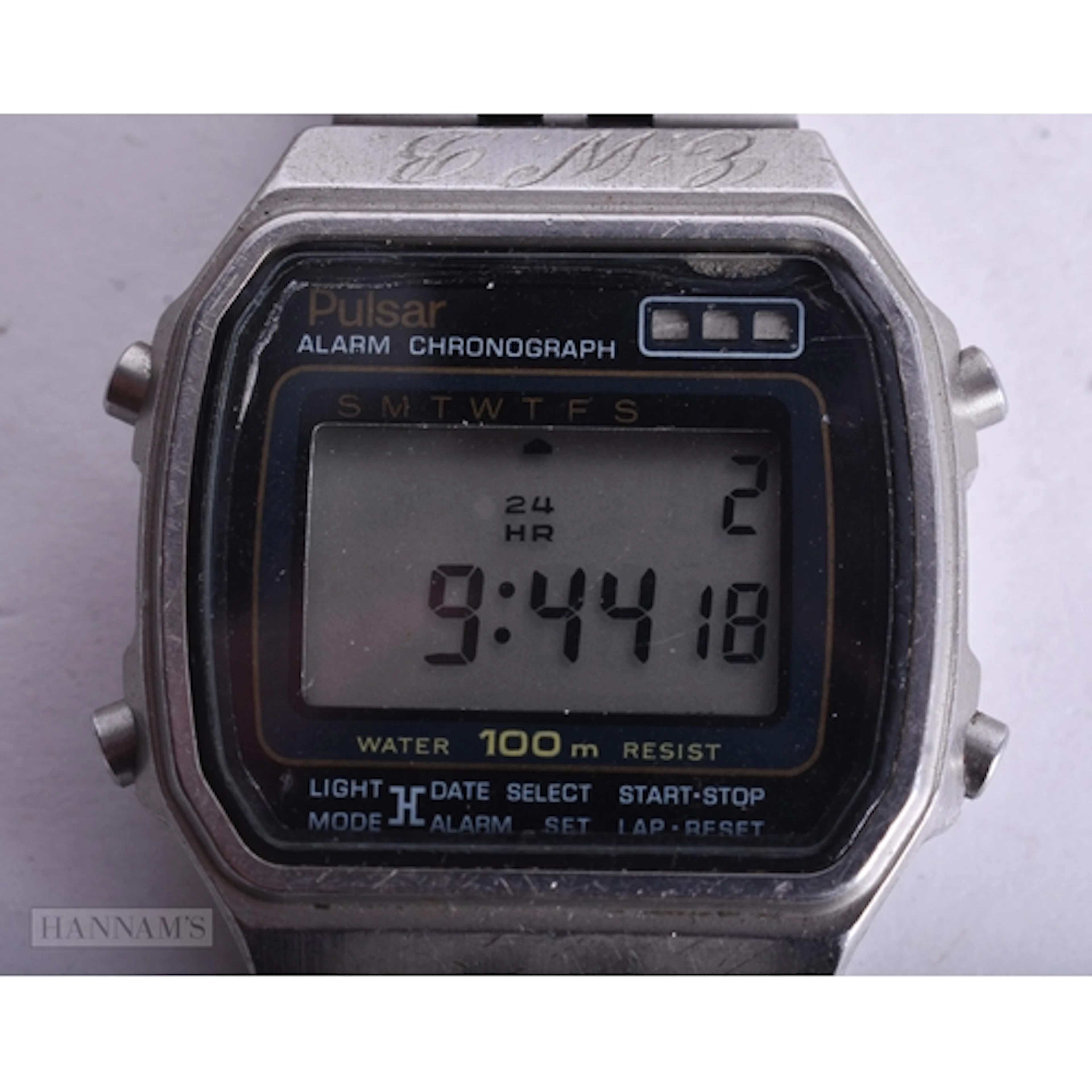 A PULSAR WRIST WATCH. Running. 3.75 cm wide.