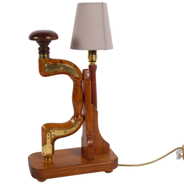 A wooden table lamp, made from a converted hand drill with b...