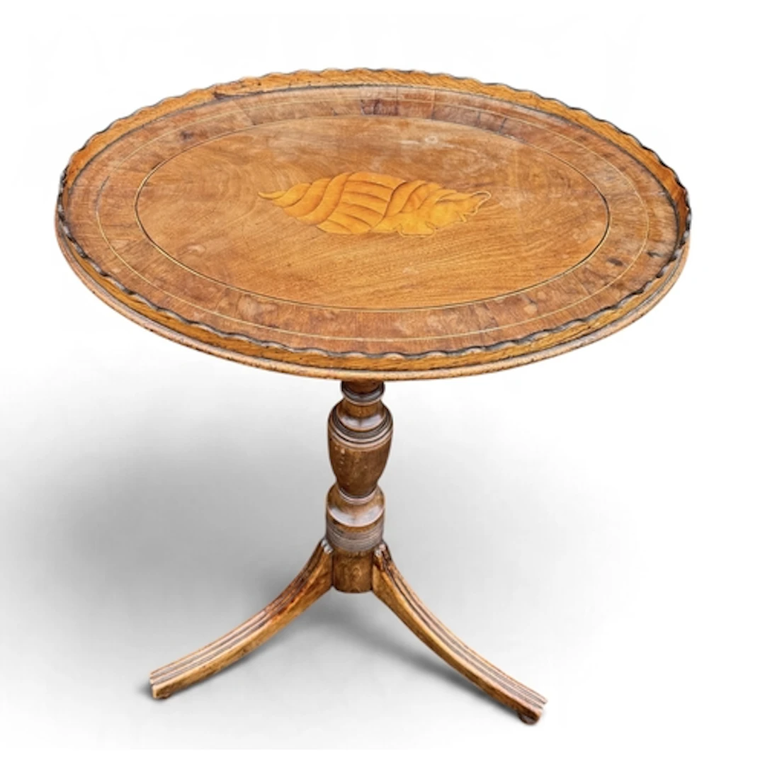A 19TH CENTURY MAHOGANY OVAL SIDE TABLE With scallopped edge...