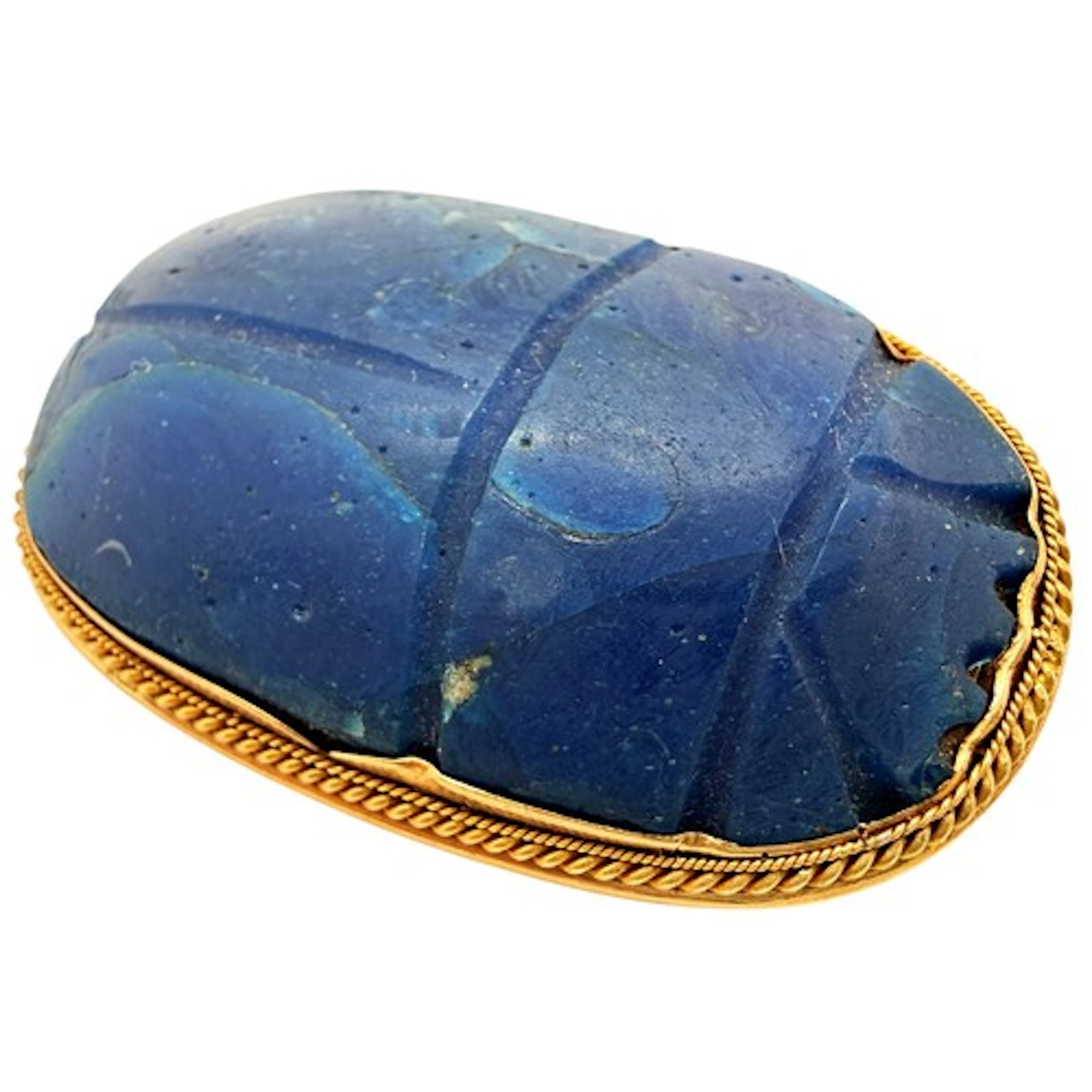 A high carat gold mounted Egyptian Revival brooch set with a...