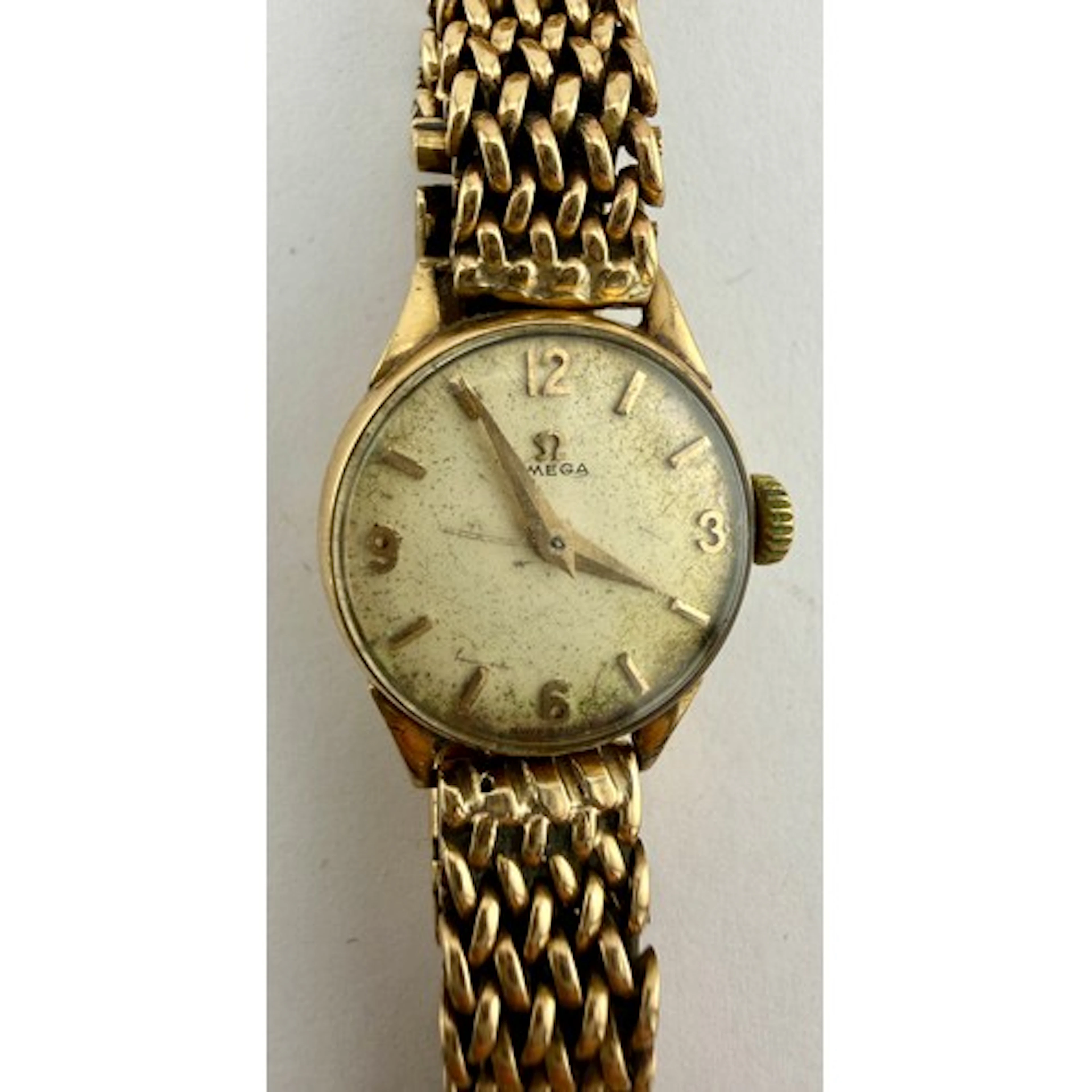 A 9 carat gold Omega ladies wristwatch with 9 carat gold bra...