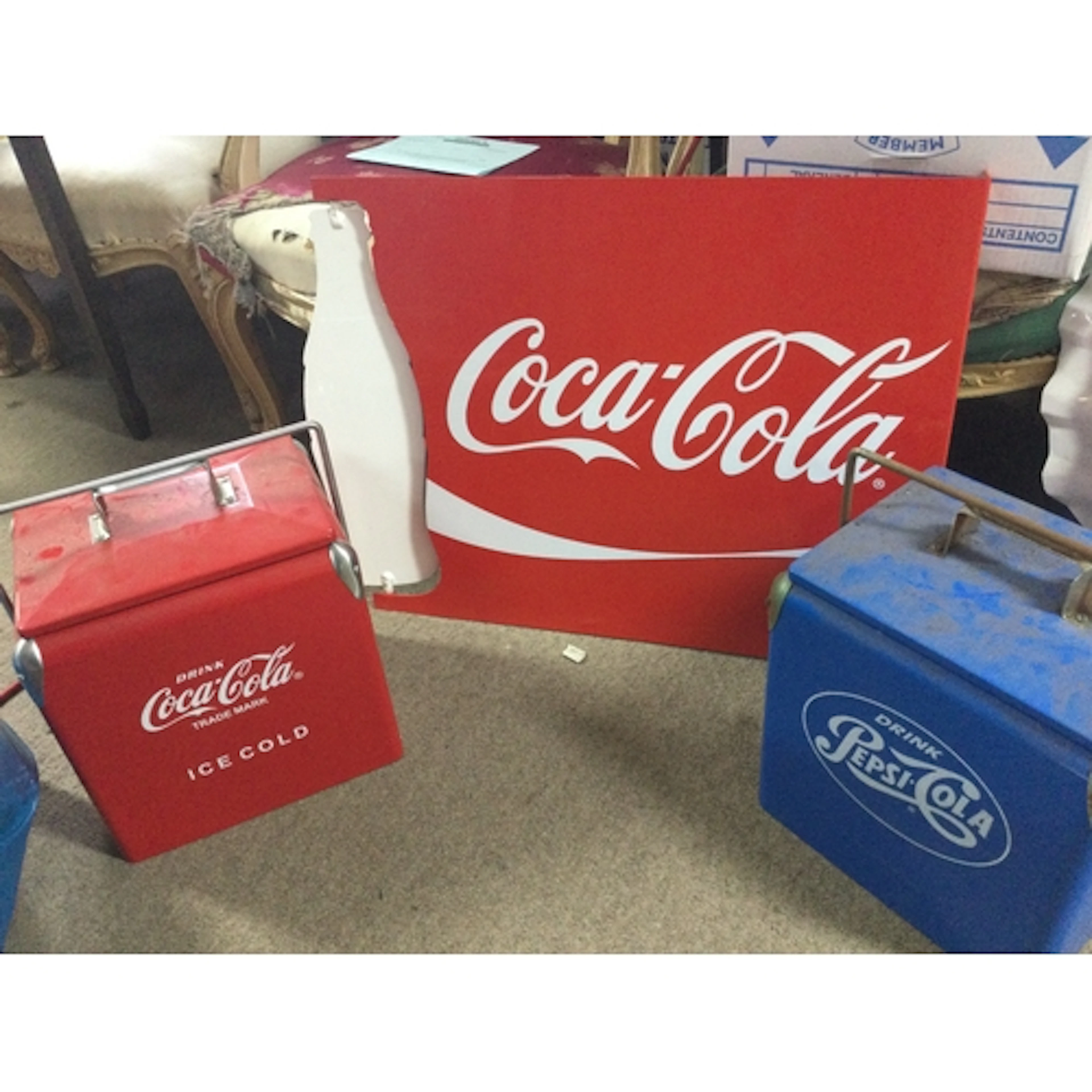 A vintage Coca Cola spinning bottle sign, Coca Cola and Peps...