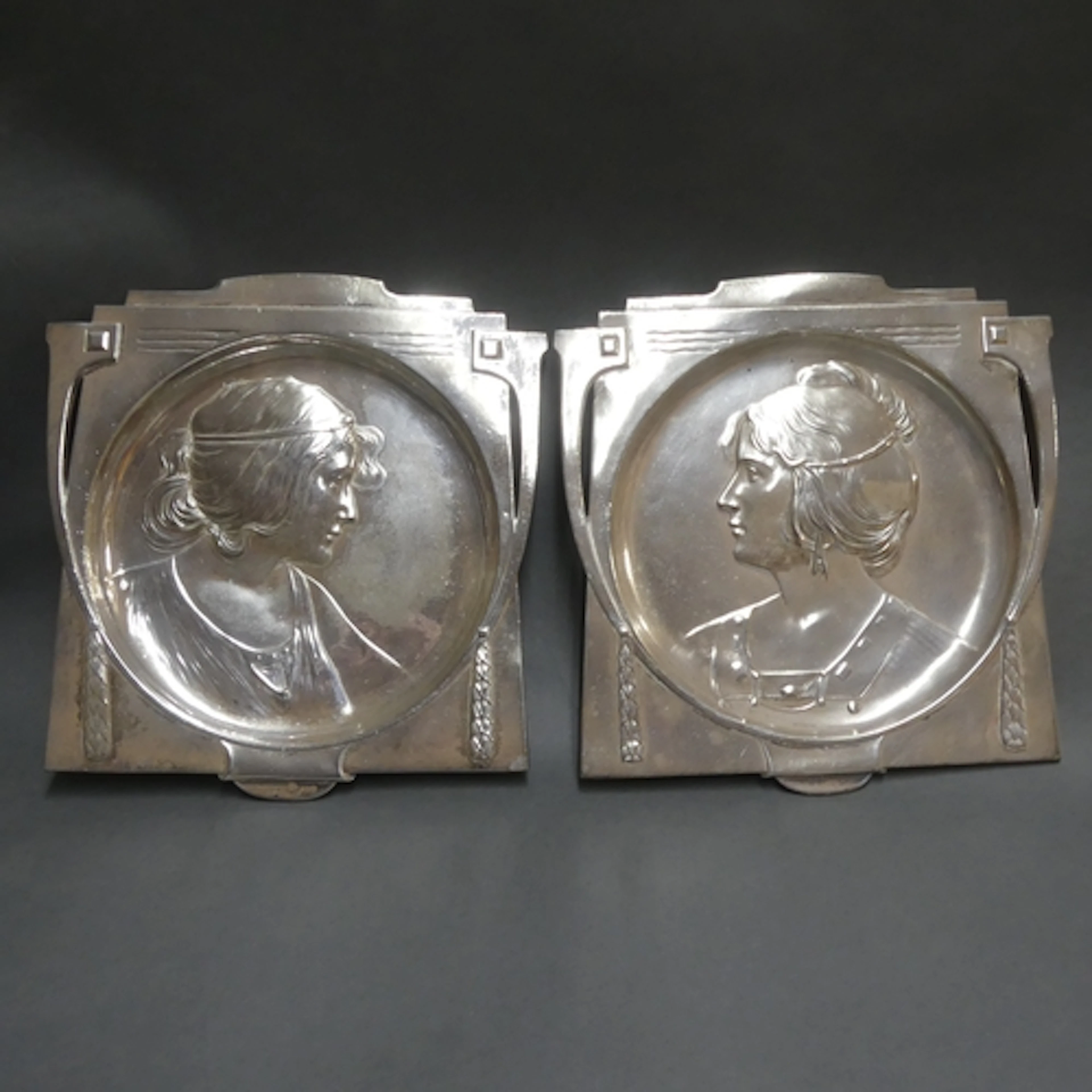 WMF - A pair of silver plated trays or wall plaques, designs...