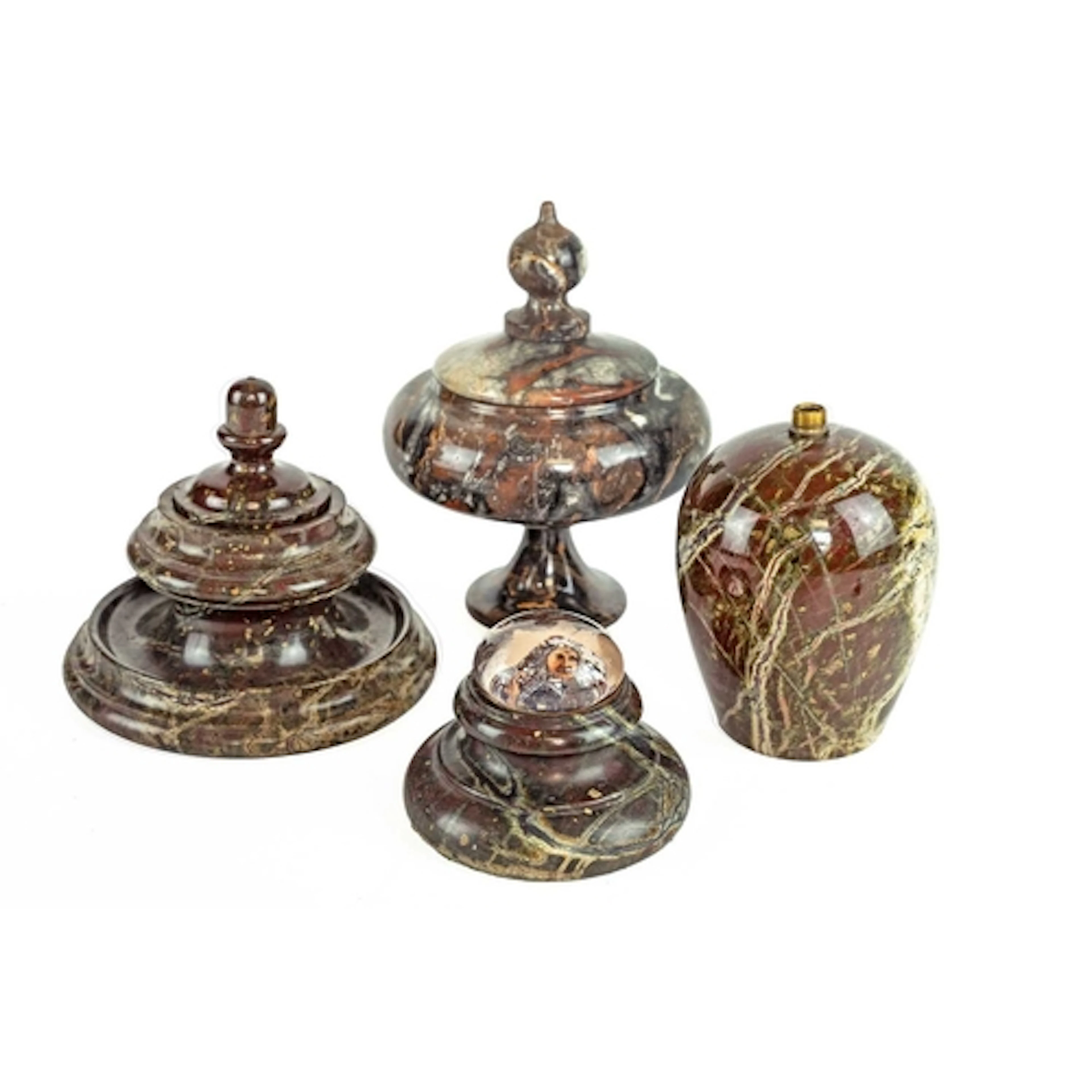 A collection of serpentine. Four pieces including a turned a...