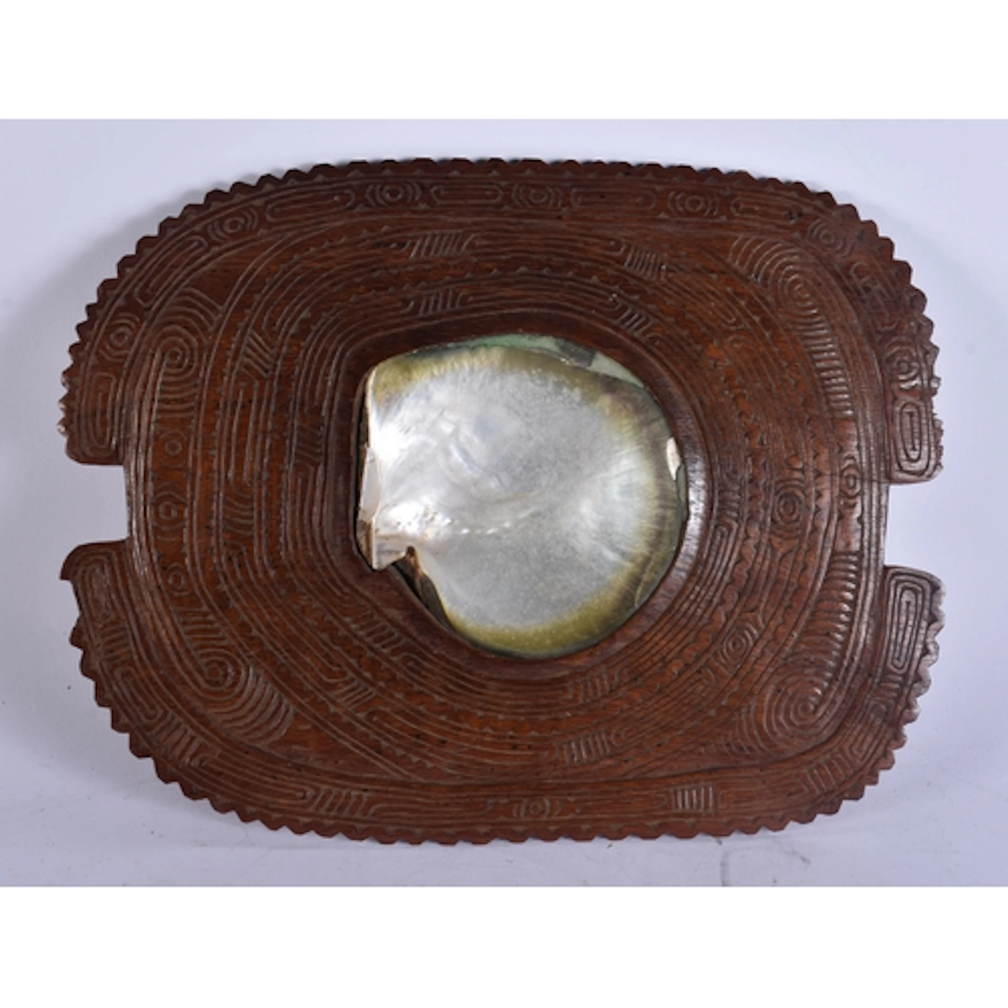 A SOUTH SEA ISLANDS POLYNESIAN TRIBAL CARVED WOOD AND MOTHER...