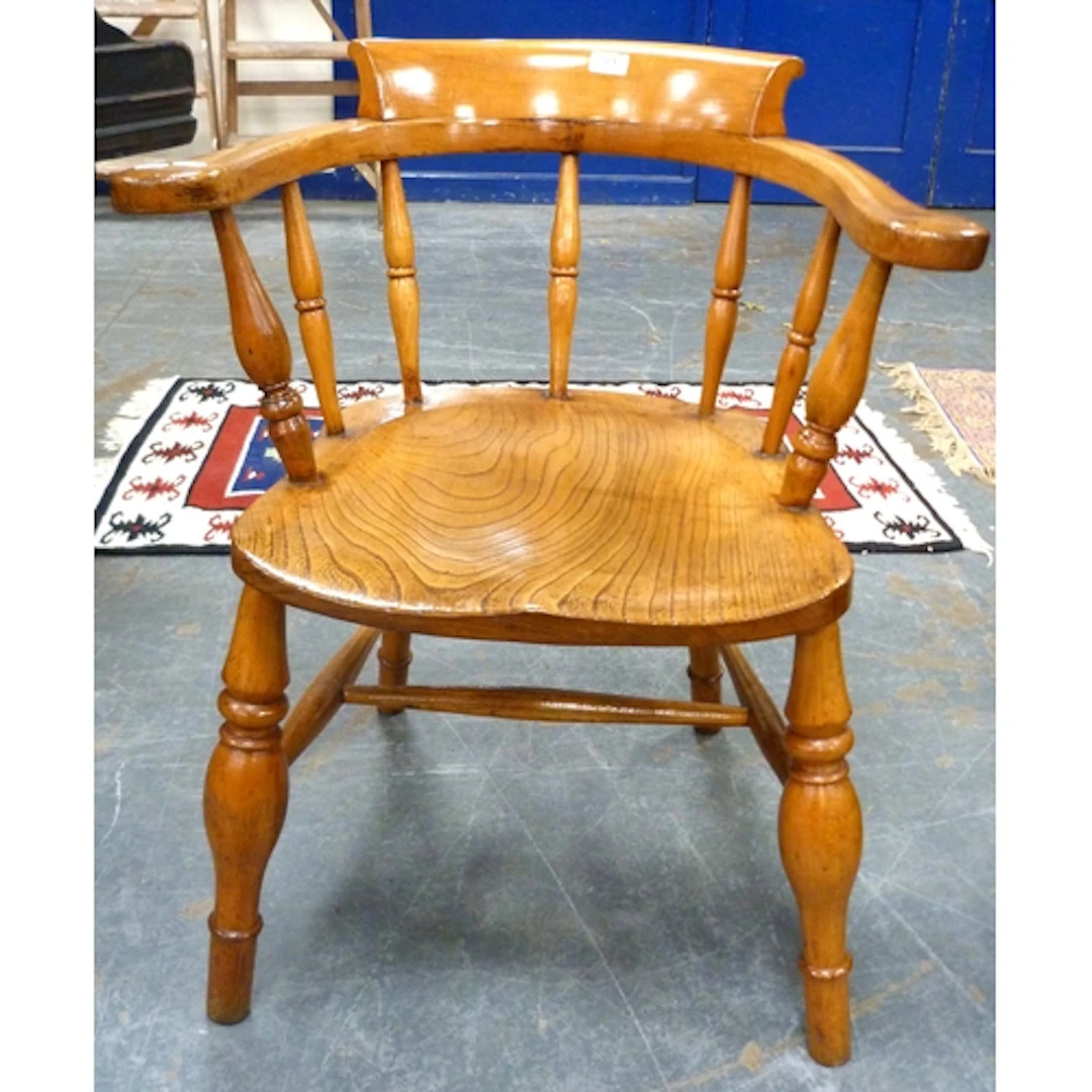 Vintage smokers bow back wooden chair.