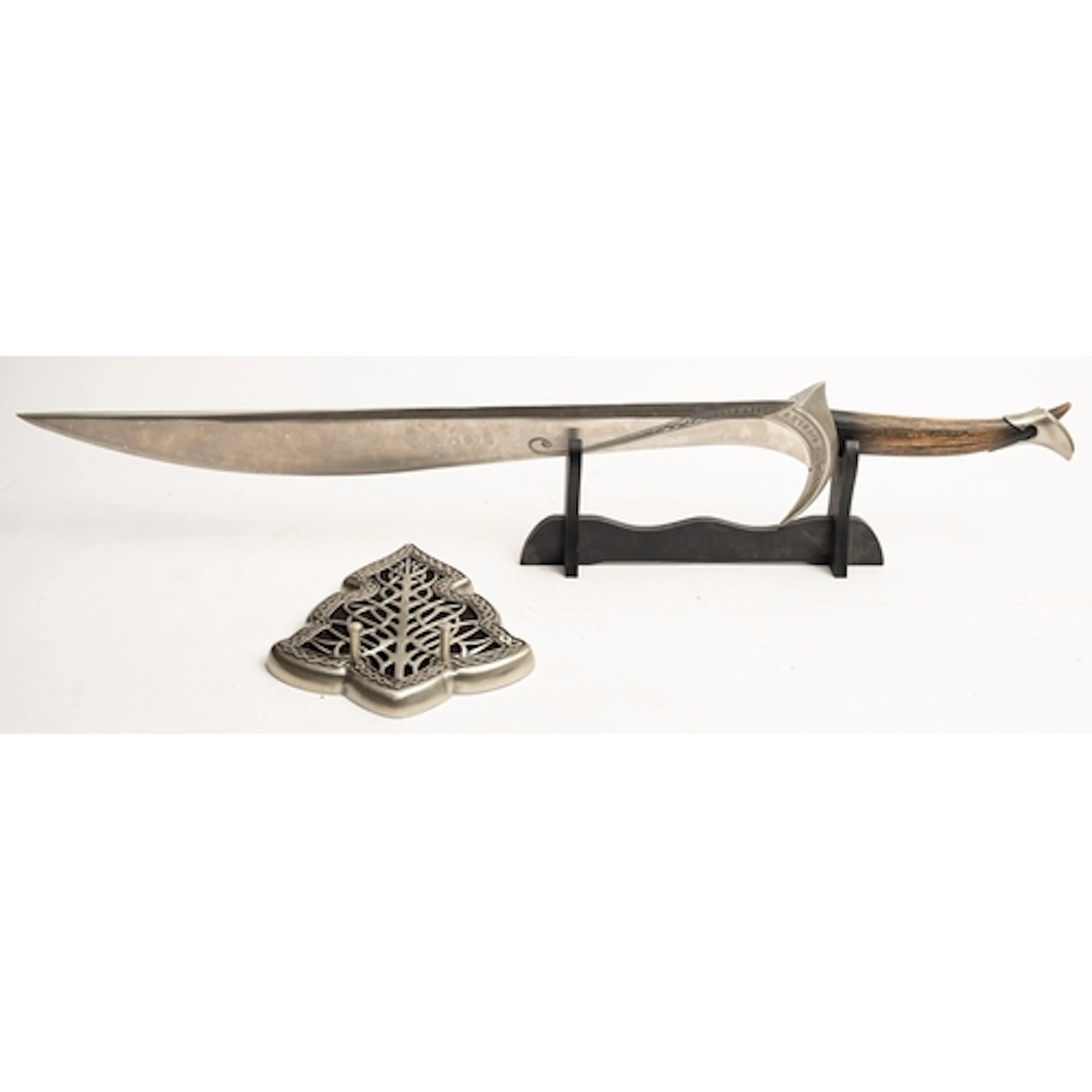 A reproduction Lord of the Rings 'Orcist' sword. having a cu...