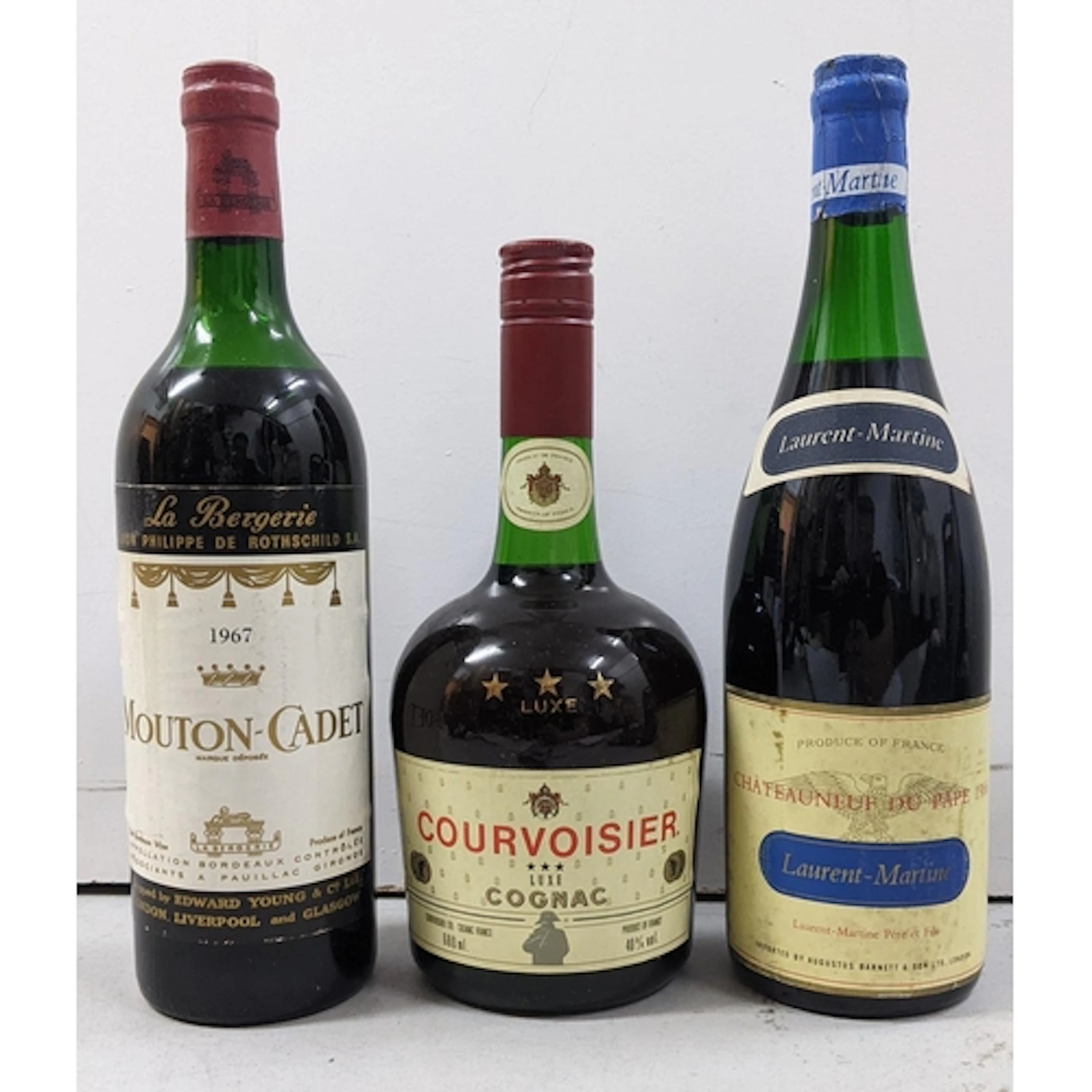 Three bottles of alcohol comprising: - 1 x Mouton-Cadet La B...