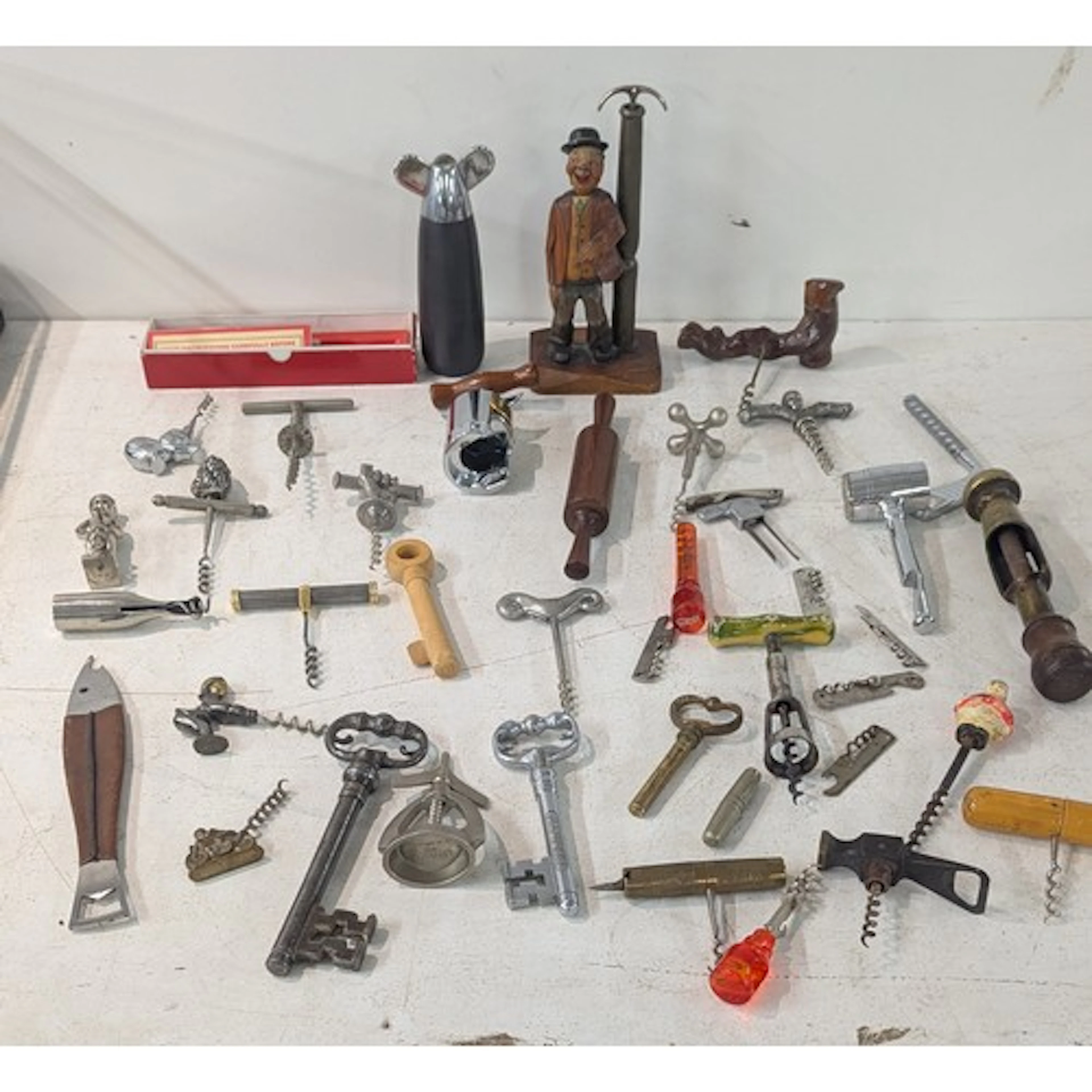 A collection of vintage corkscrews to include an example fas...