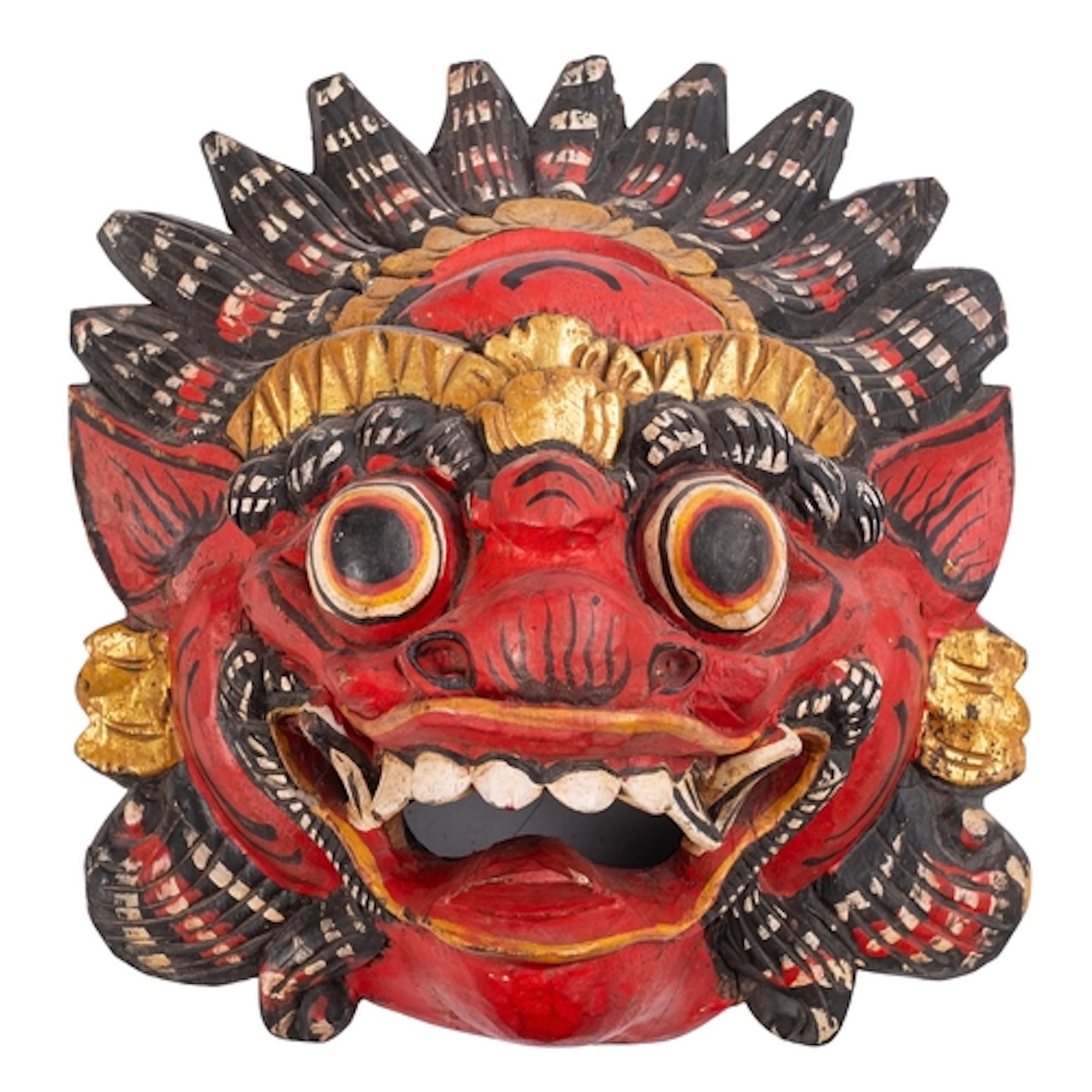 A Balinese carved wooden Barong Rakshasa mask, the fierce vi...