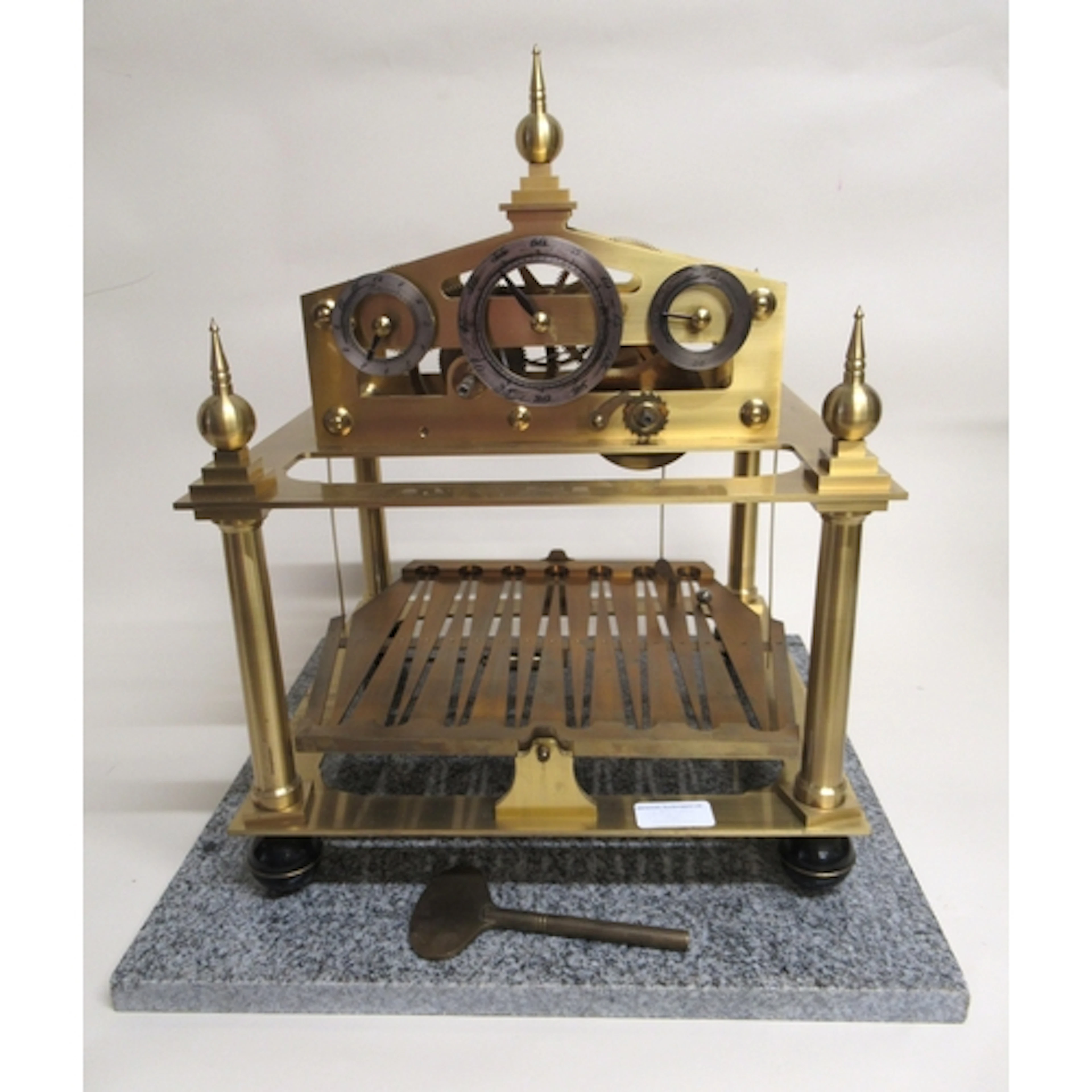 Mid 20th Century brass Congreve clock with single train fuse...