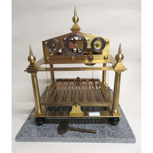 Mid 20th Century brass Congreve clock with single train fuse...