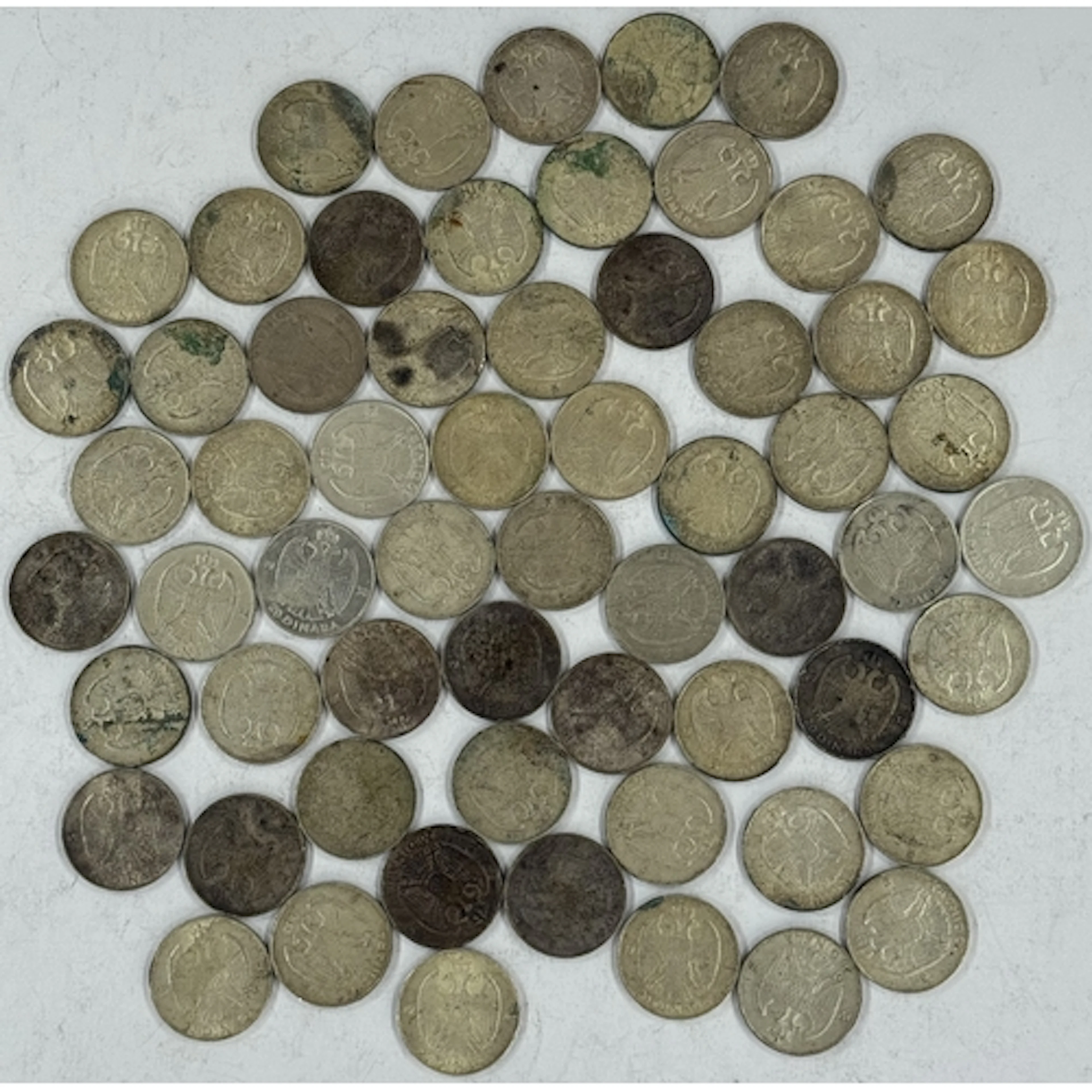 Coins: Yugoslavia 20 Dinara coins, condition varies from fin...