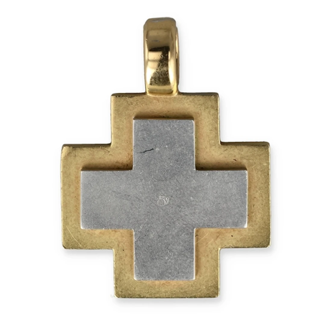 AN 18CT WHITE AND YELLOW GOLD CROSS PENDANT Weight: 34gms ...