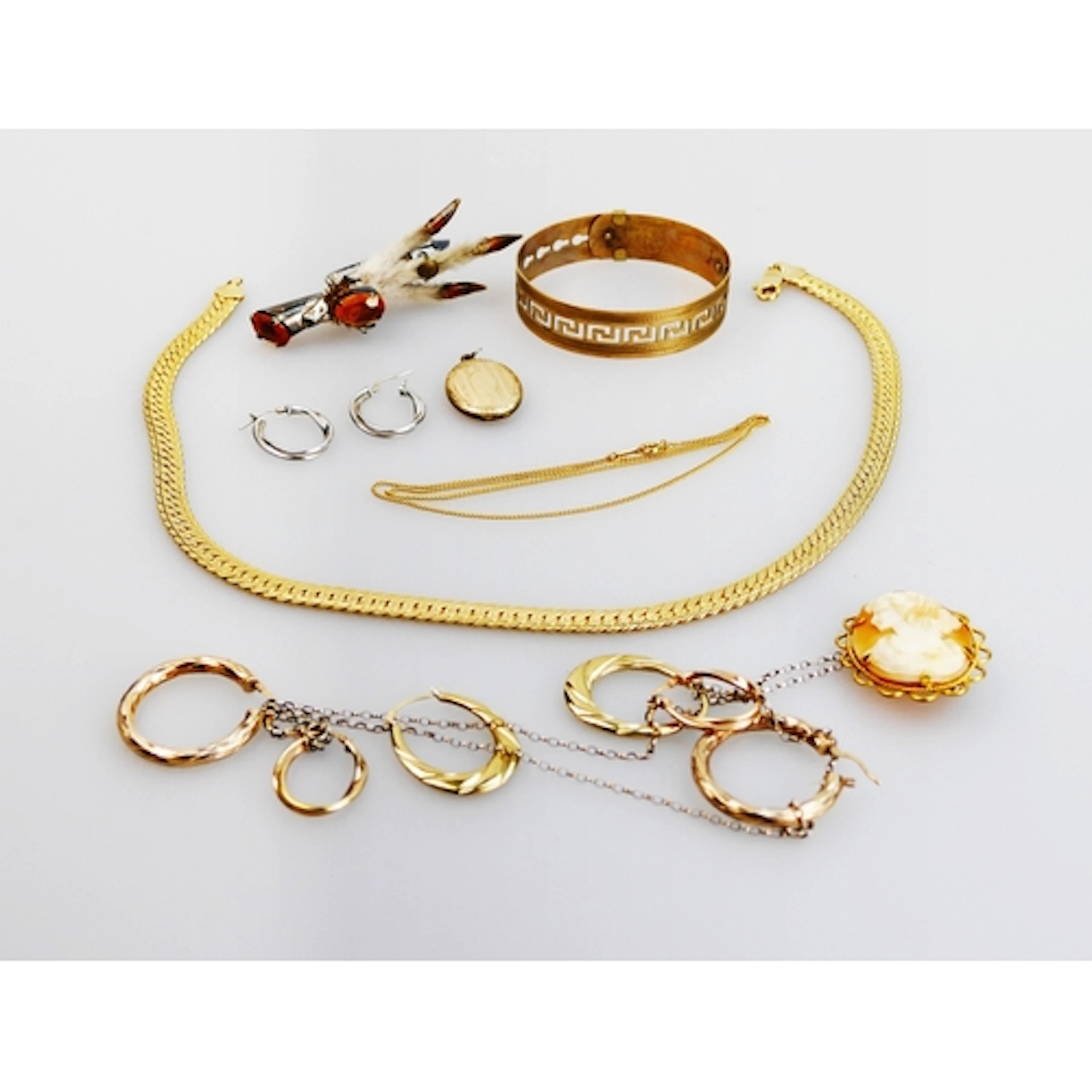 A small selection of silver and gold plated jewellery includ...
