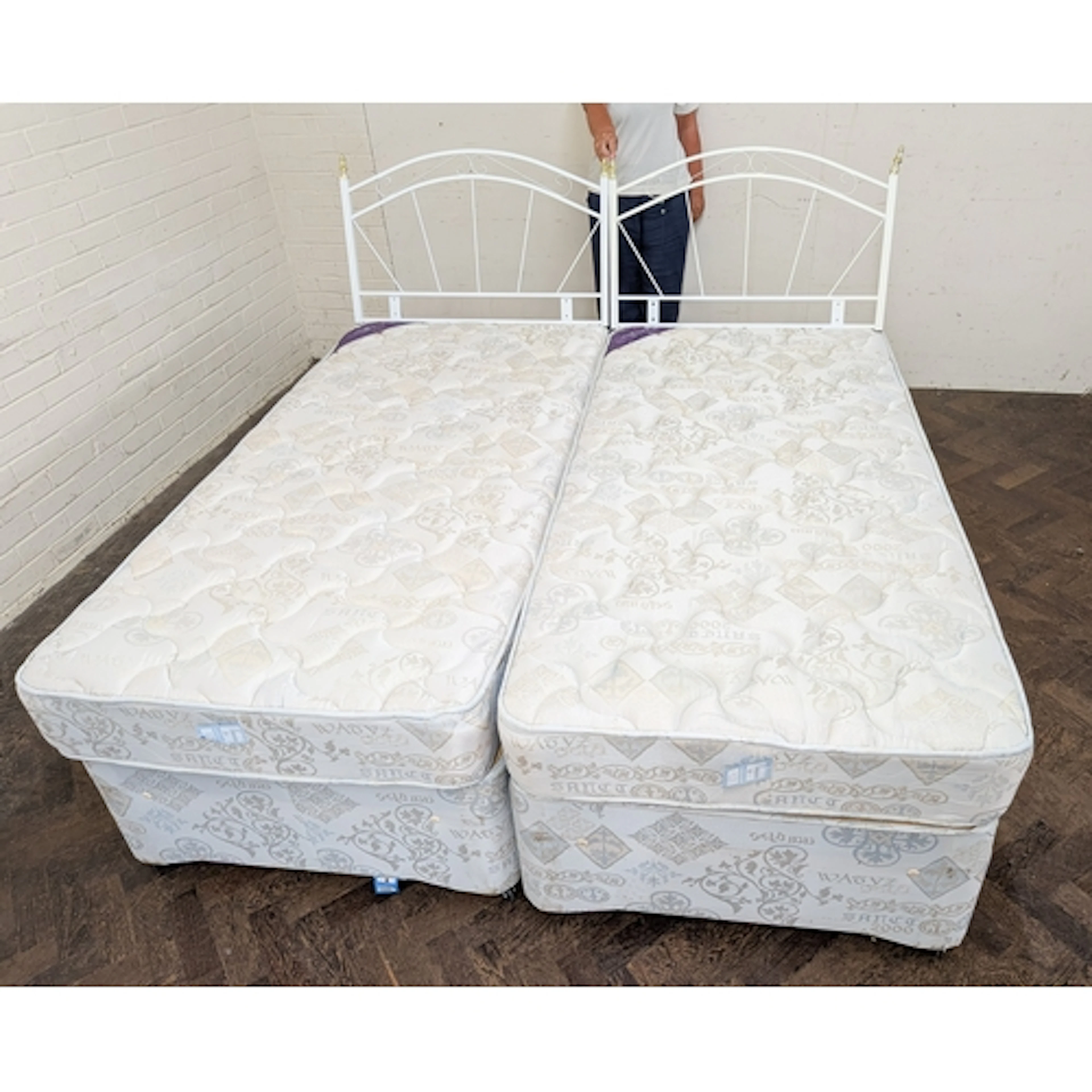A pair of 3' drawer divans with matching mattresses