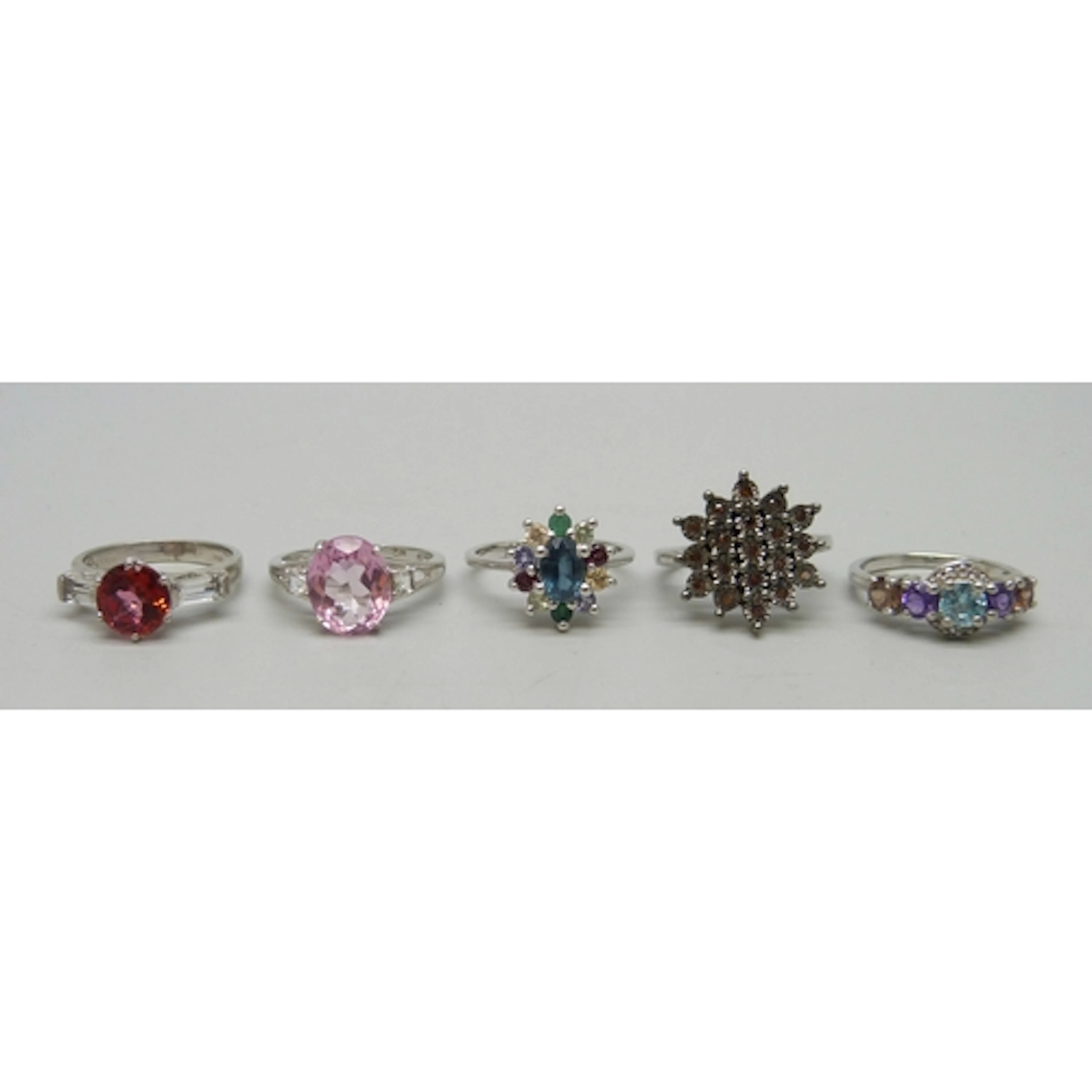 A collection of five silver TGGC and other gemstone rings, 1...