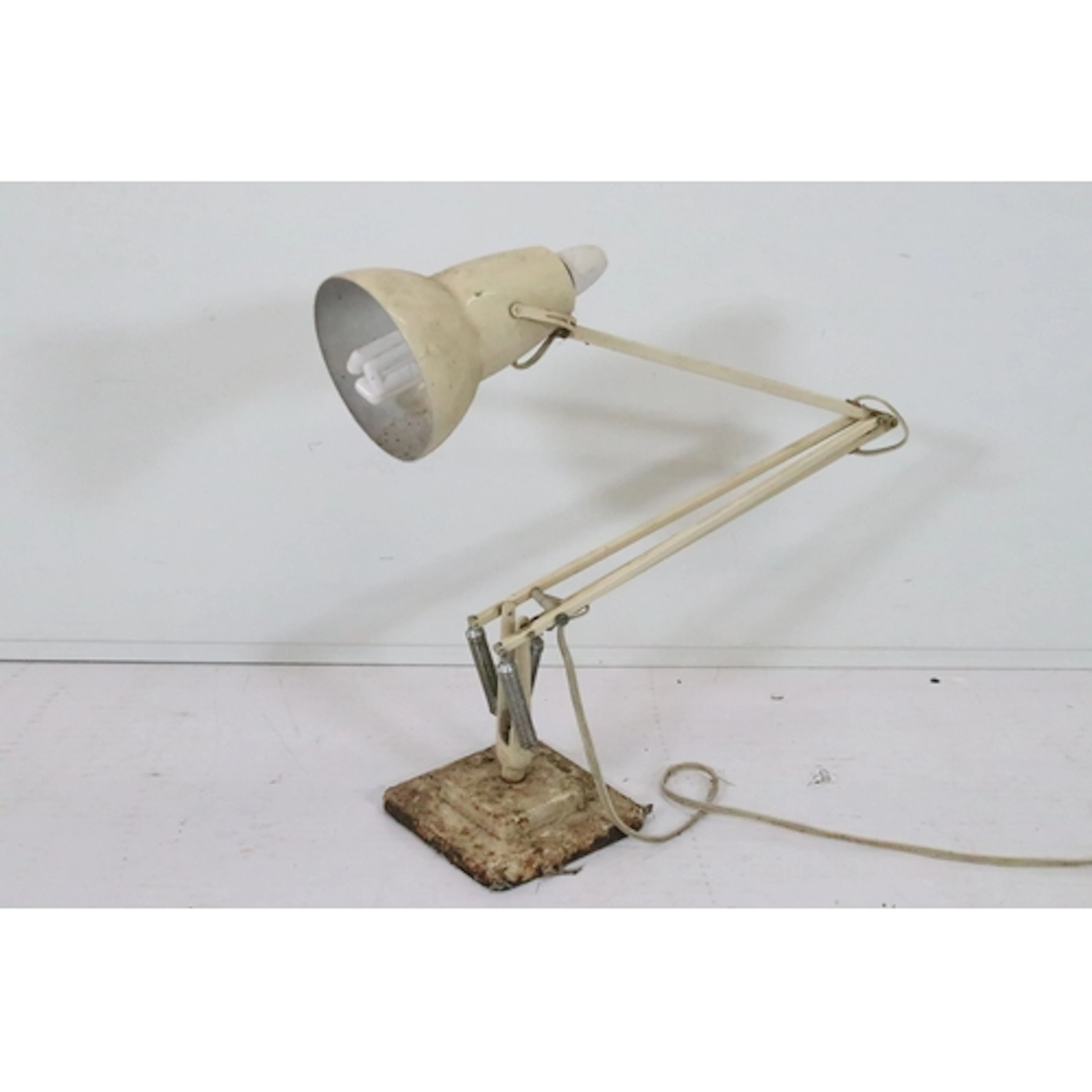 Herbert Terry & Son Anglepoise lamp, in cream ground, having...