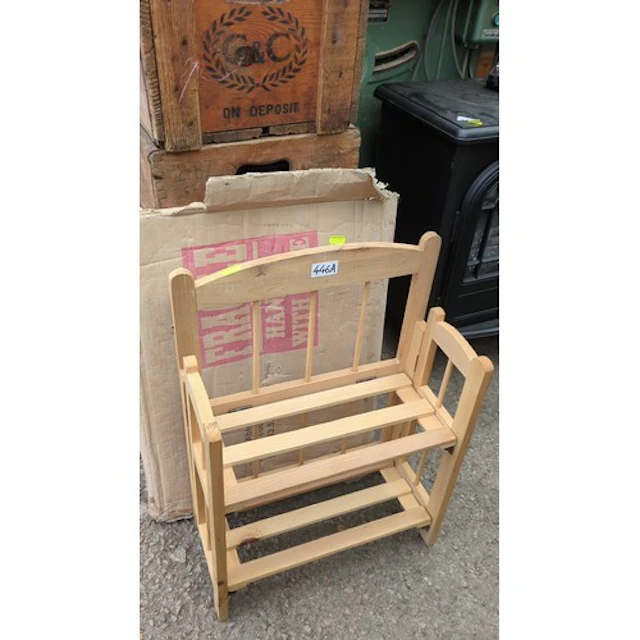 Folding pine magazine rack with box.