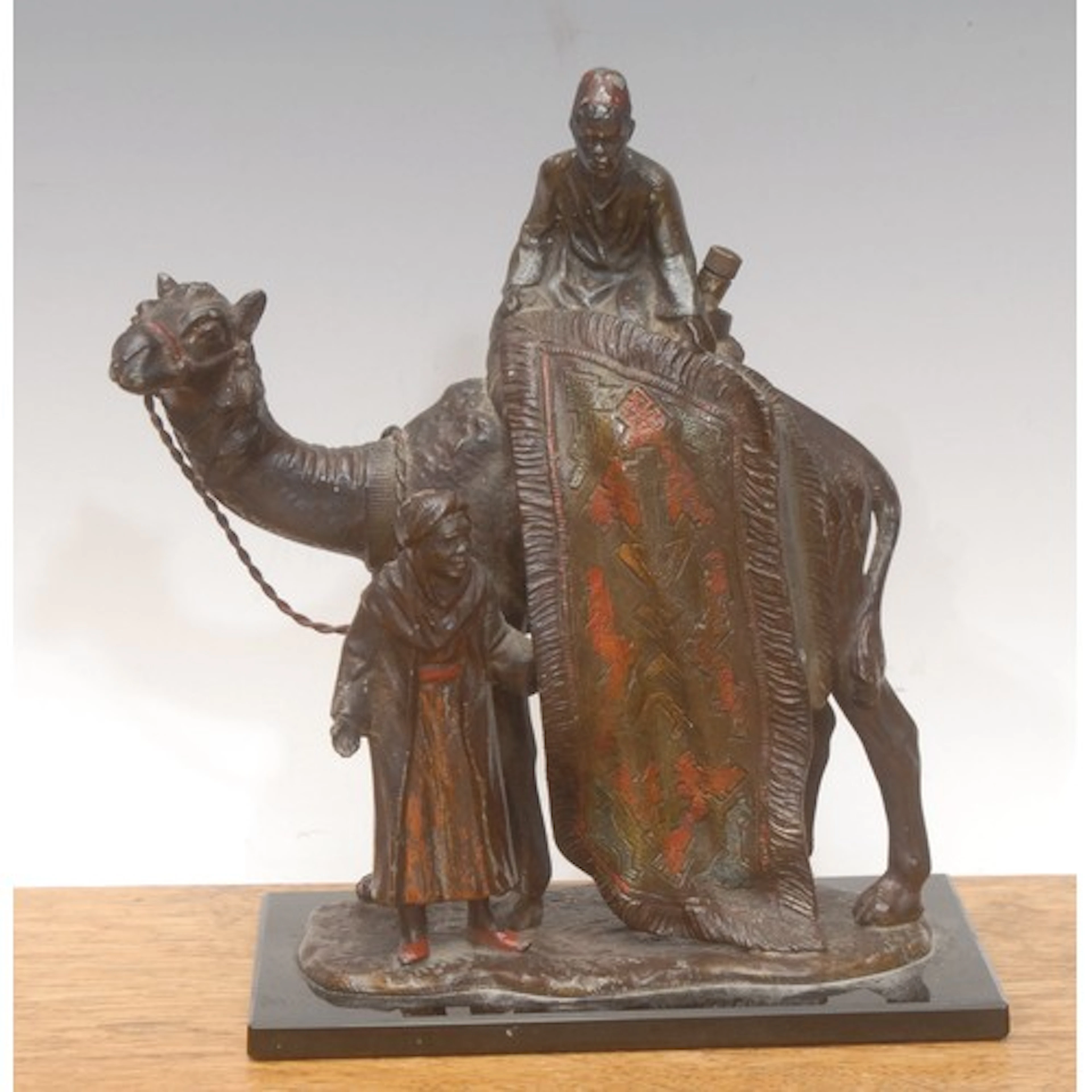 An Austrian cold painted spelter novelty table lighter, in t...