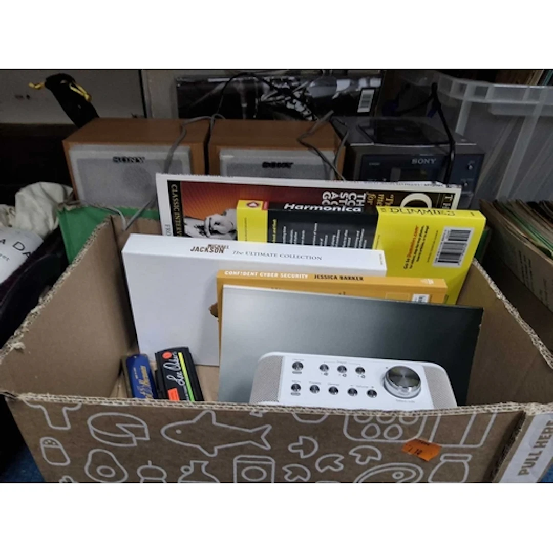A CD PLAYER, RECORDS, AND HARMONICA RELATED ITEMS to include...